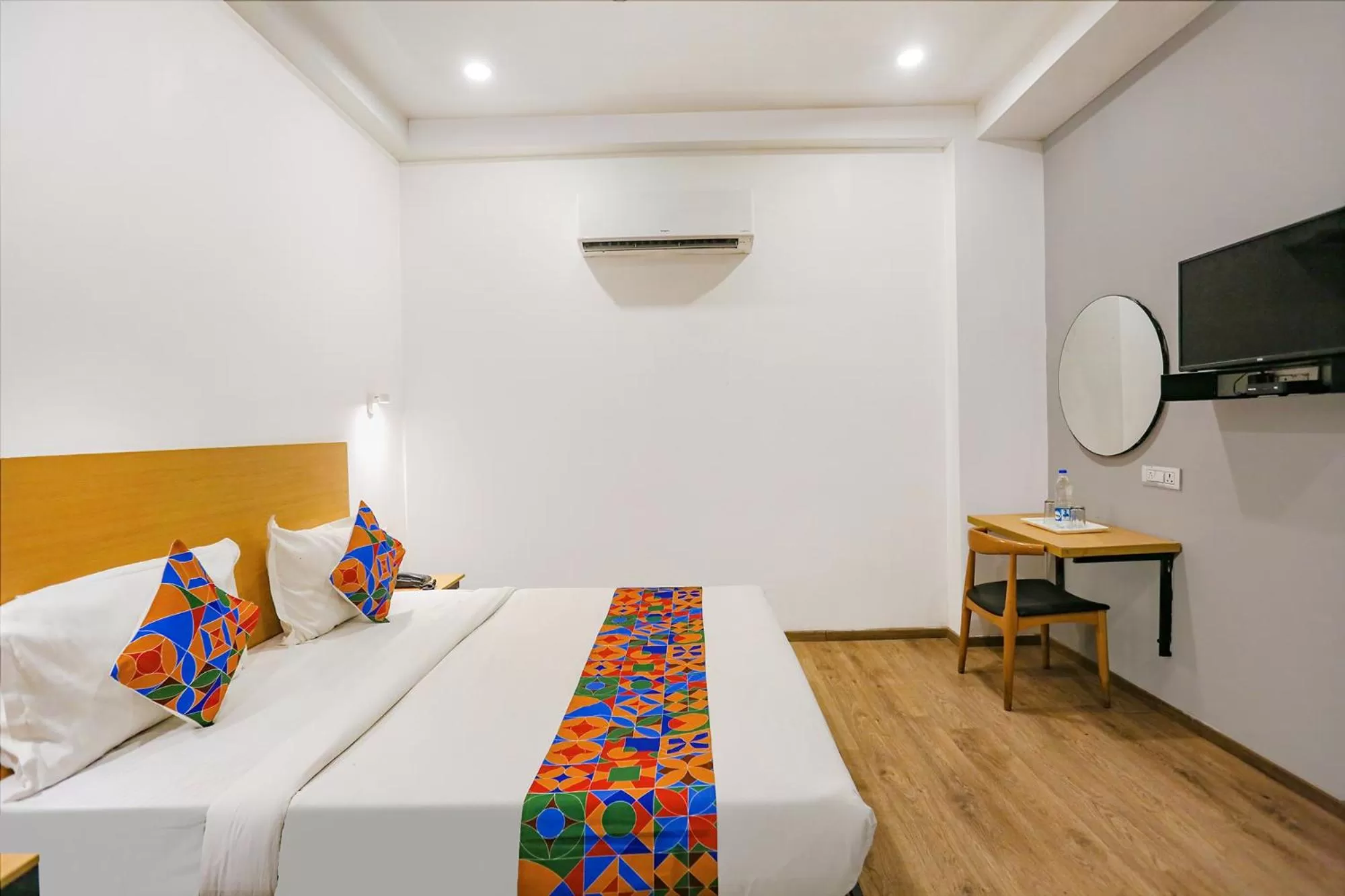 Communal lounge/ TV room, Bed in FabHotel Roseman