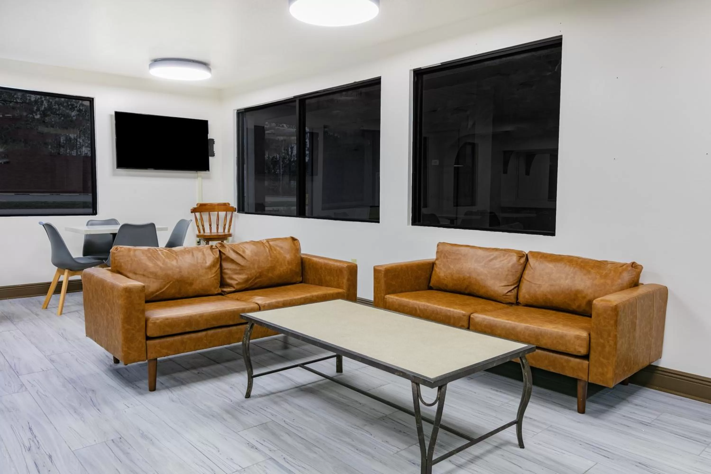 Seating area in Super 8 by Wyndham Moss Point