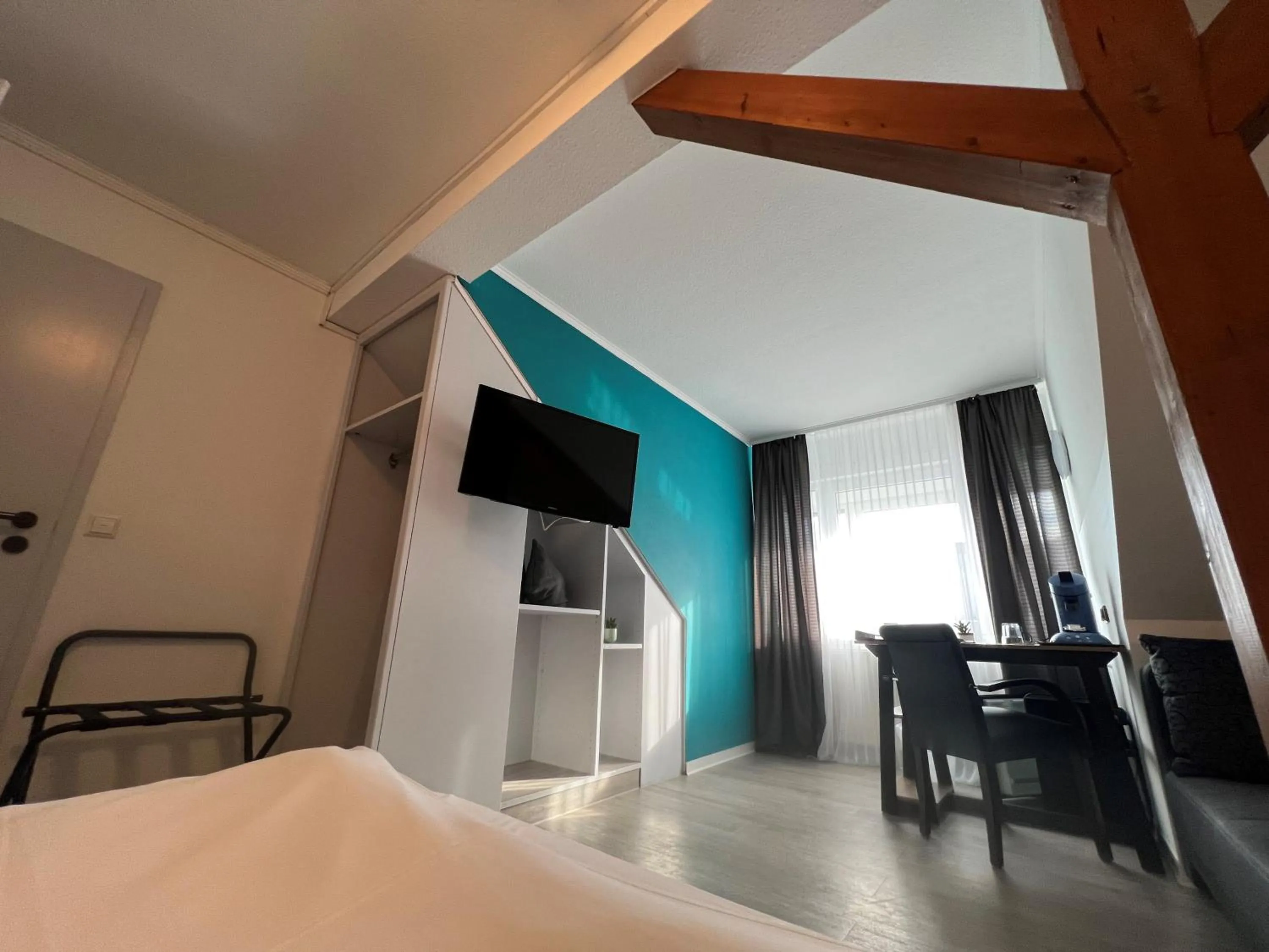 Photo of the whole room, Bed in Hotel Bitzer Backnang