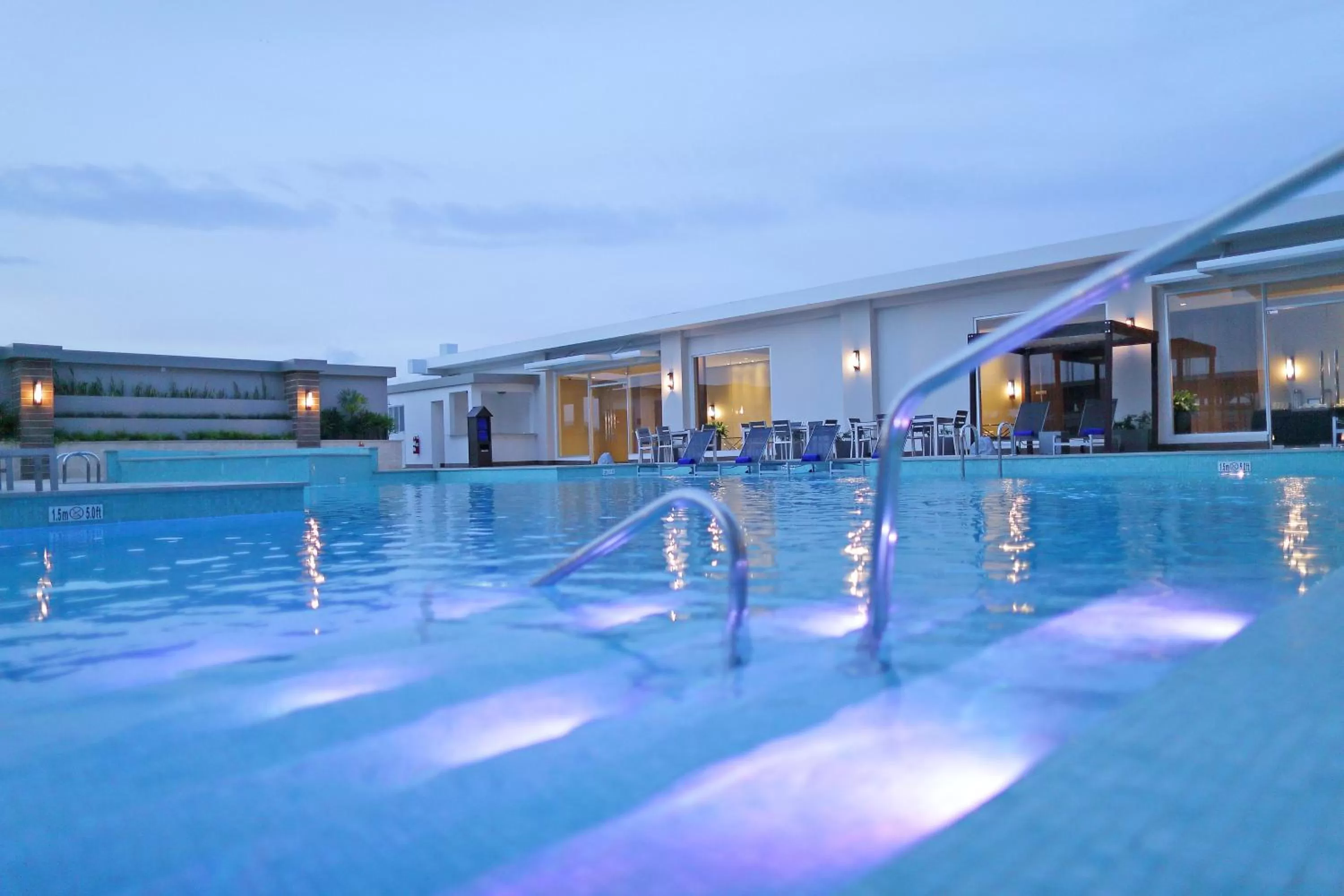 Swimming pool in Crowne Plaza Airport by IHG