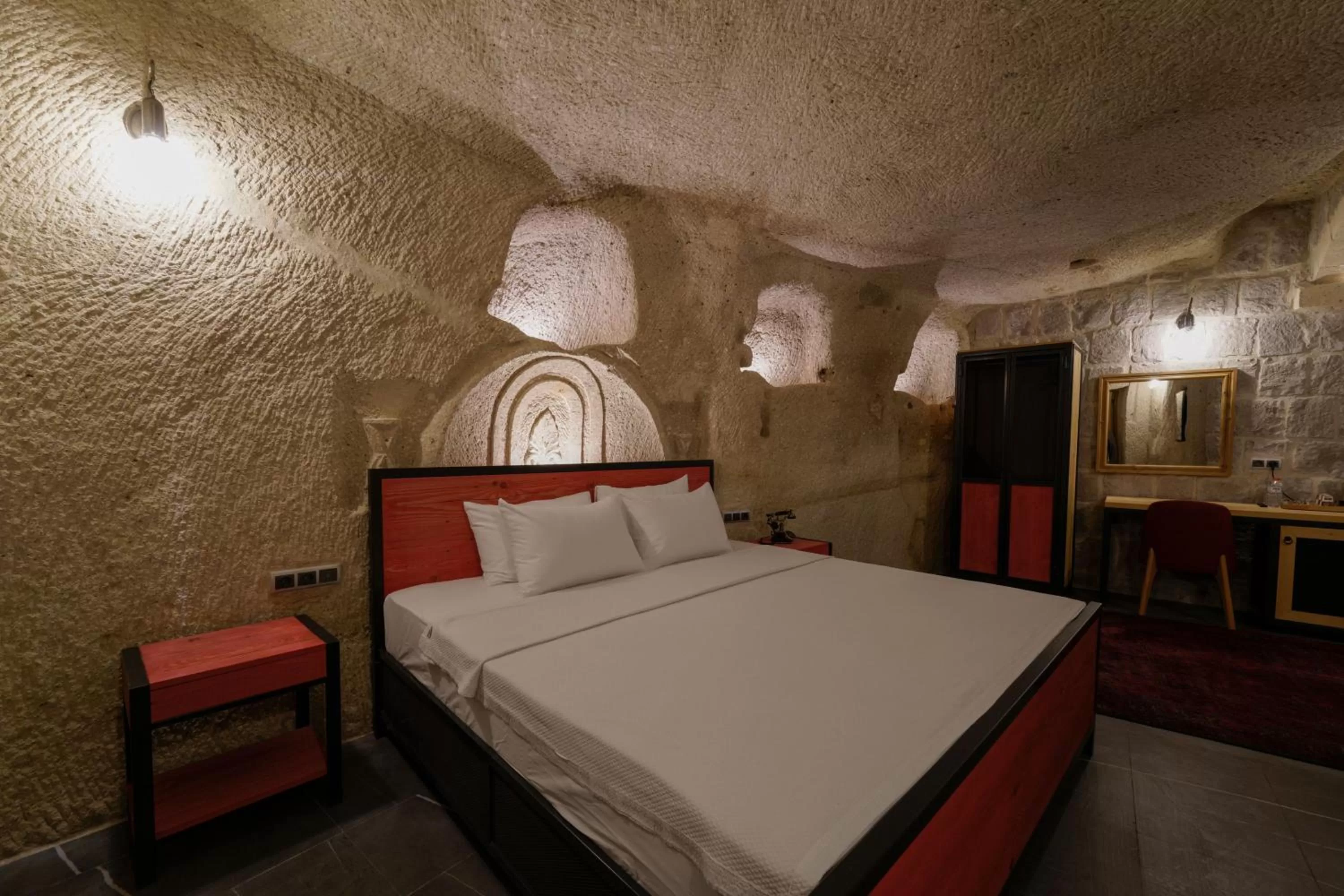 Bed in The Niche Cave Hotel