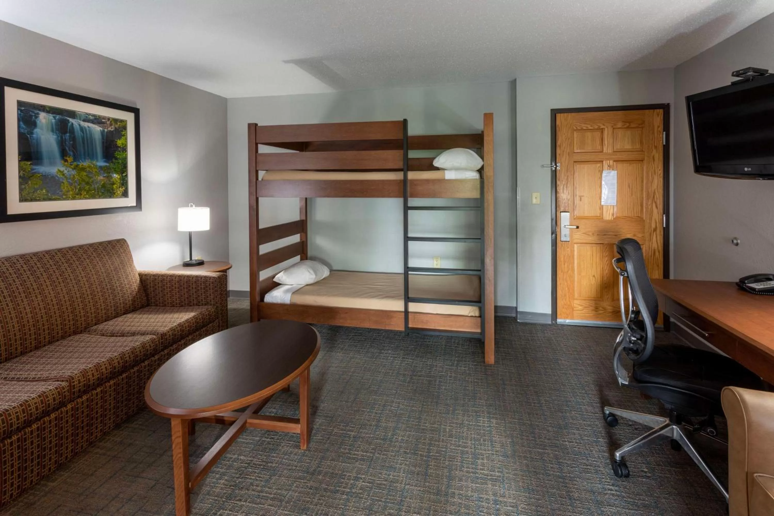 Photo of the whole room, Bed in Black Beach Inn by GrandStay