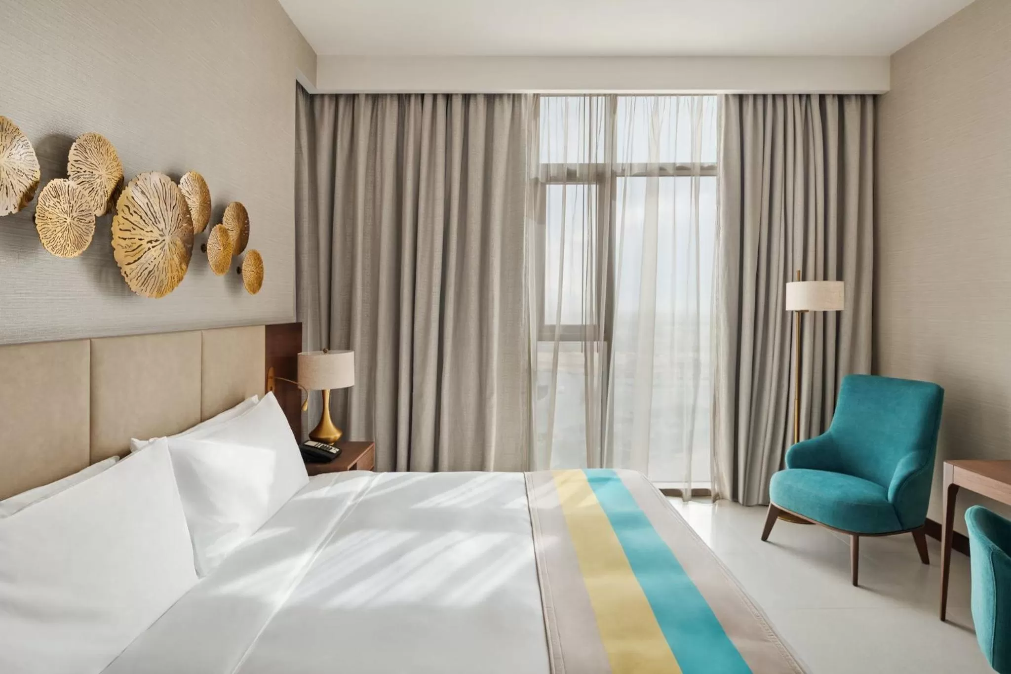 Photo of the whole room, Bed in Holiday Inn Dubai Al-Maktoum Airport by IHG
