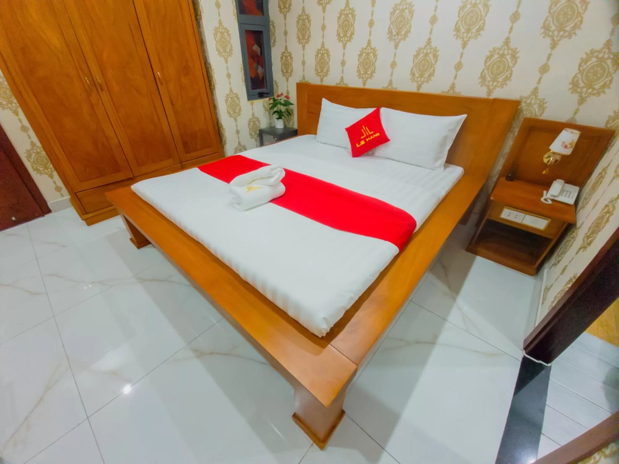 Bed in LEHA Saigon Hotel Airport