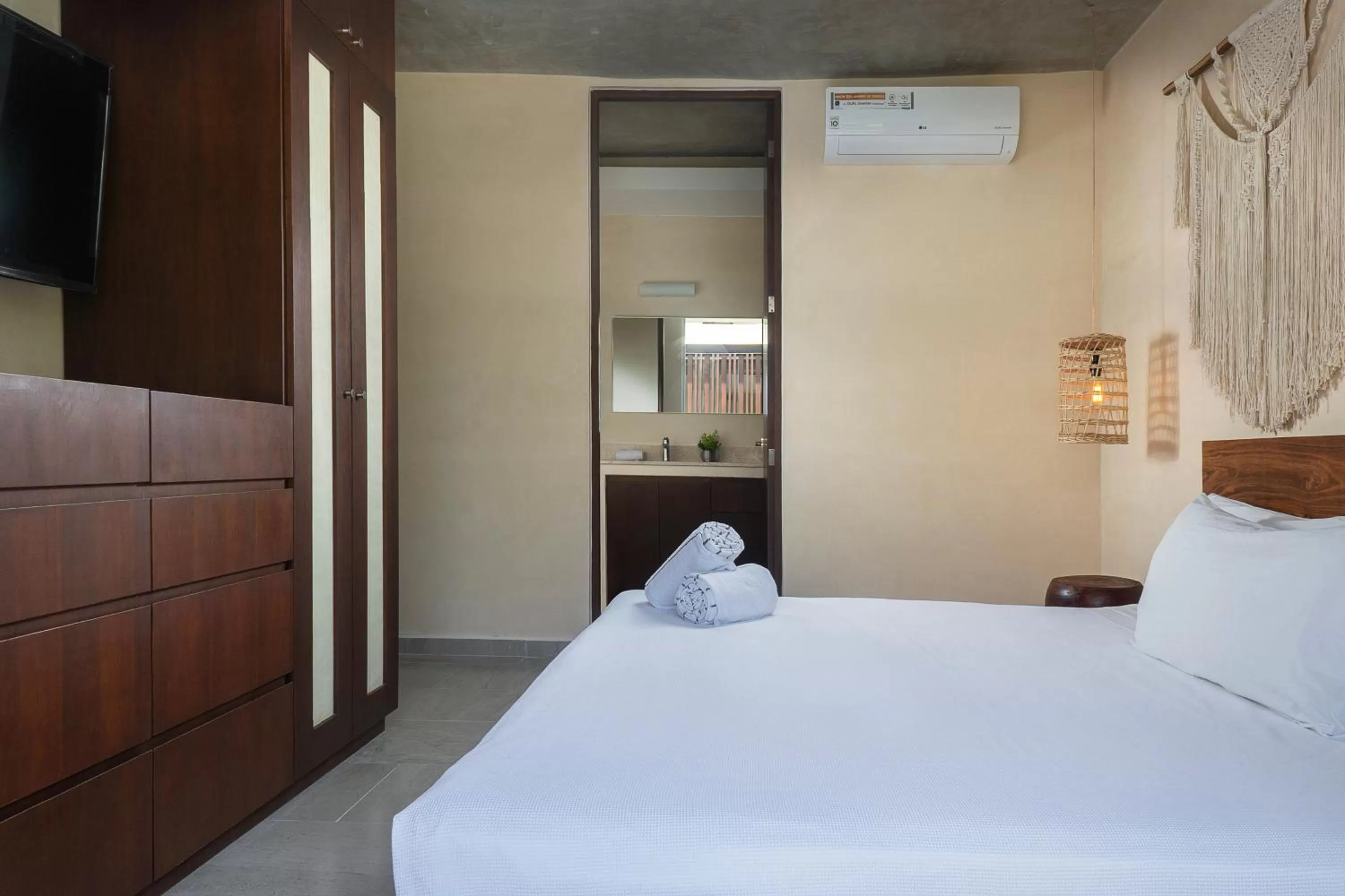 Bed in ARUNA TULUM-Luxury Studios & Apartments