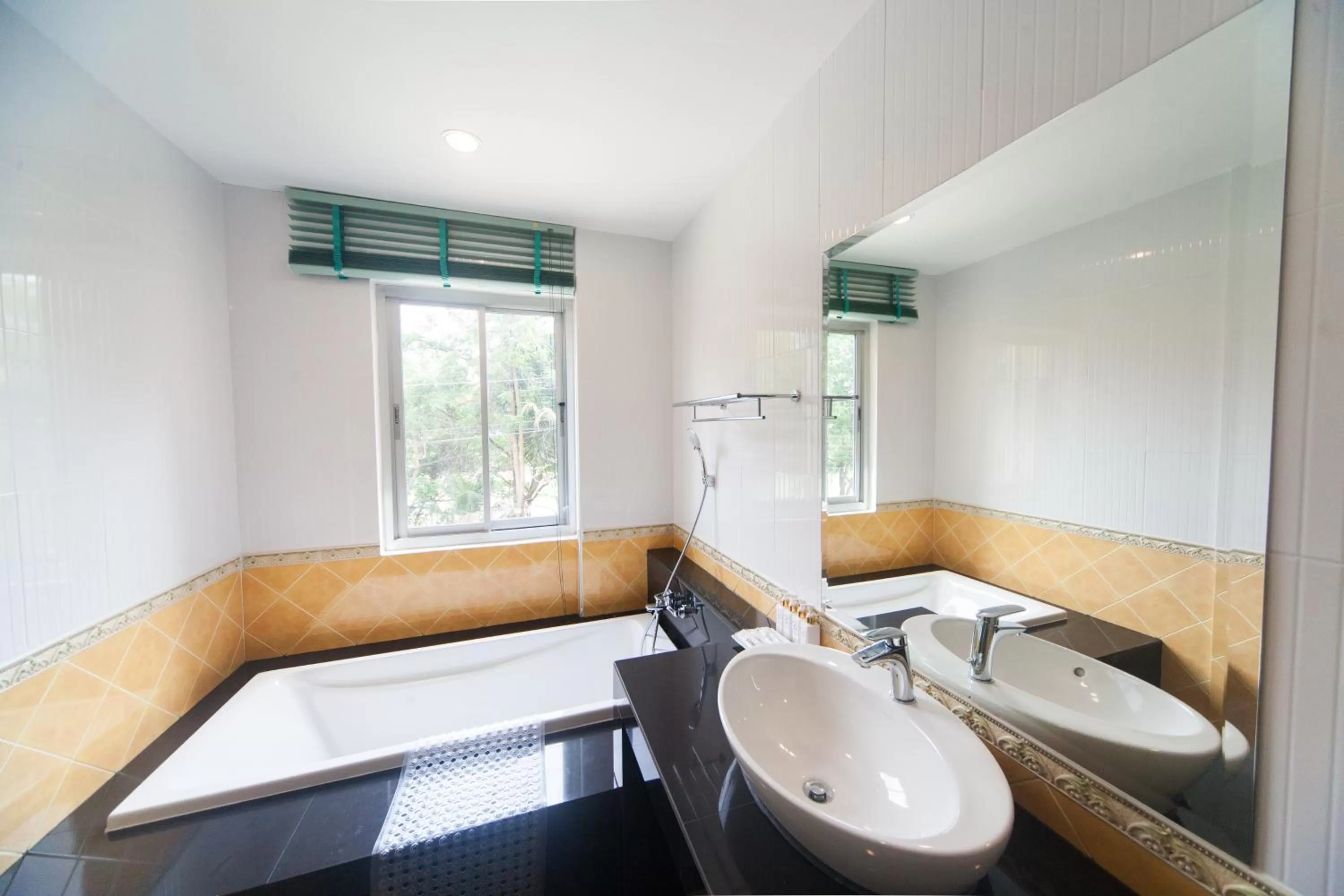 Bathroom in Anchan Laguna Hotel โรงแรมอัญชันลากูน่า