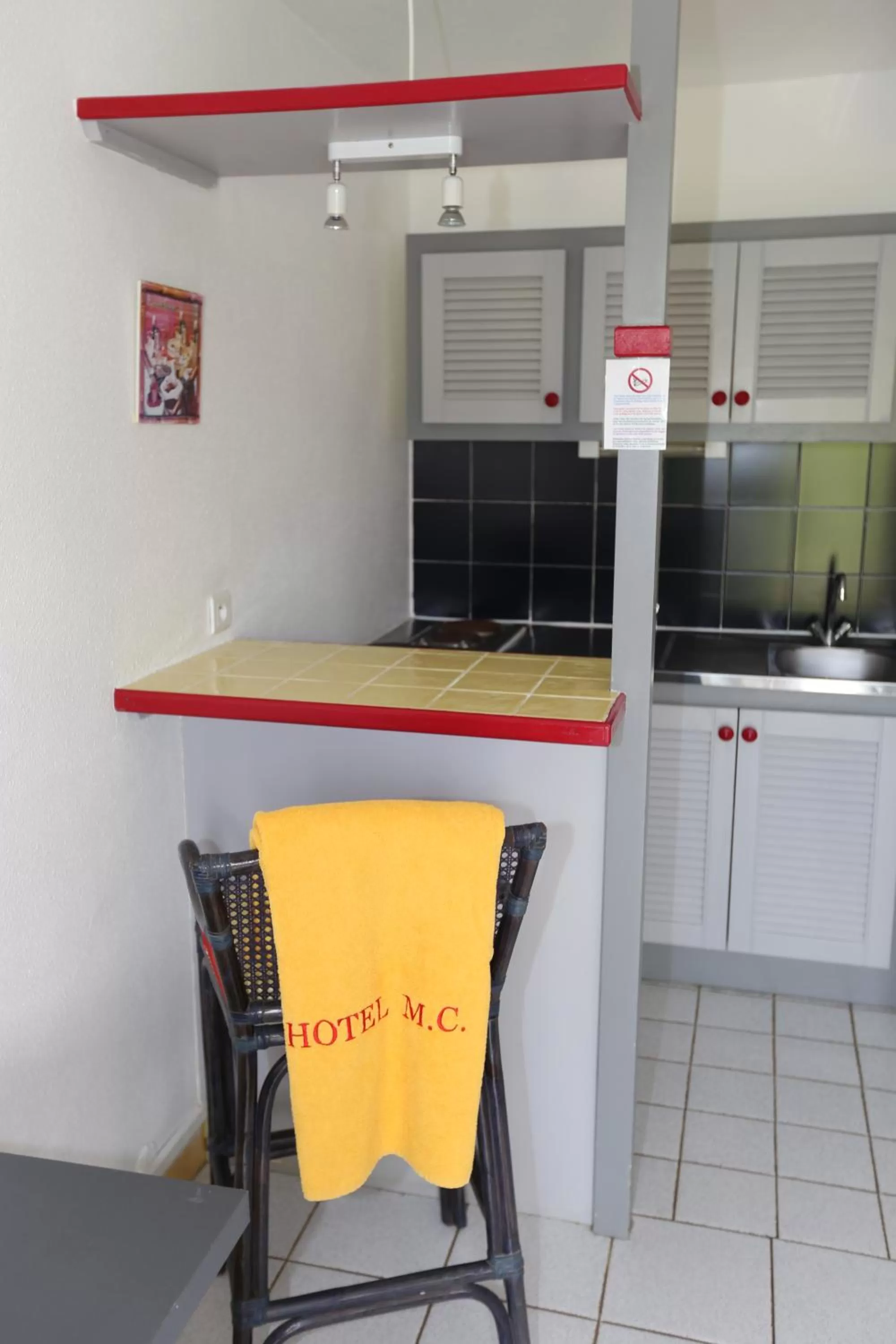 Kitchen or kitchenette in Hotel La Maison Creole