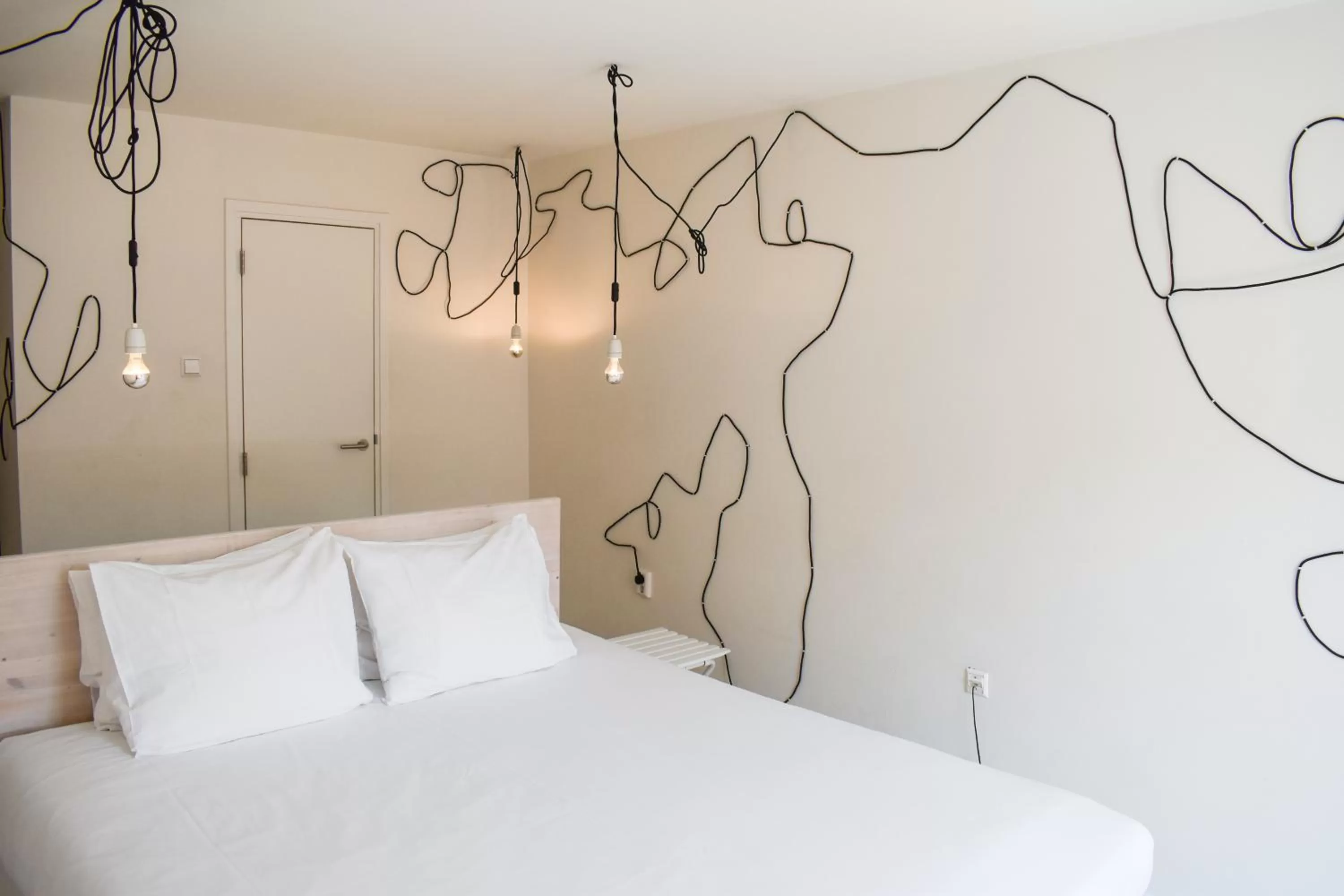 Bed in Hotel The Exchange