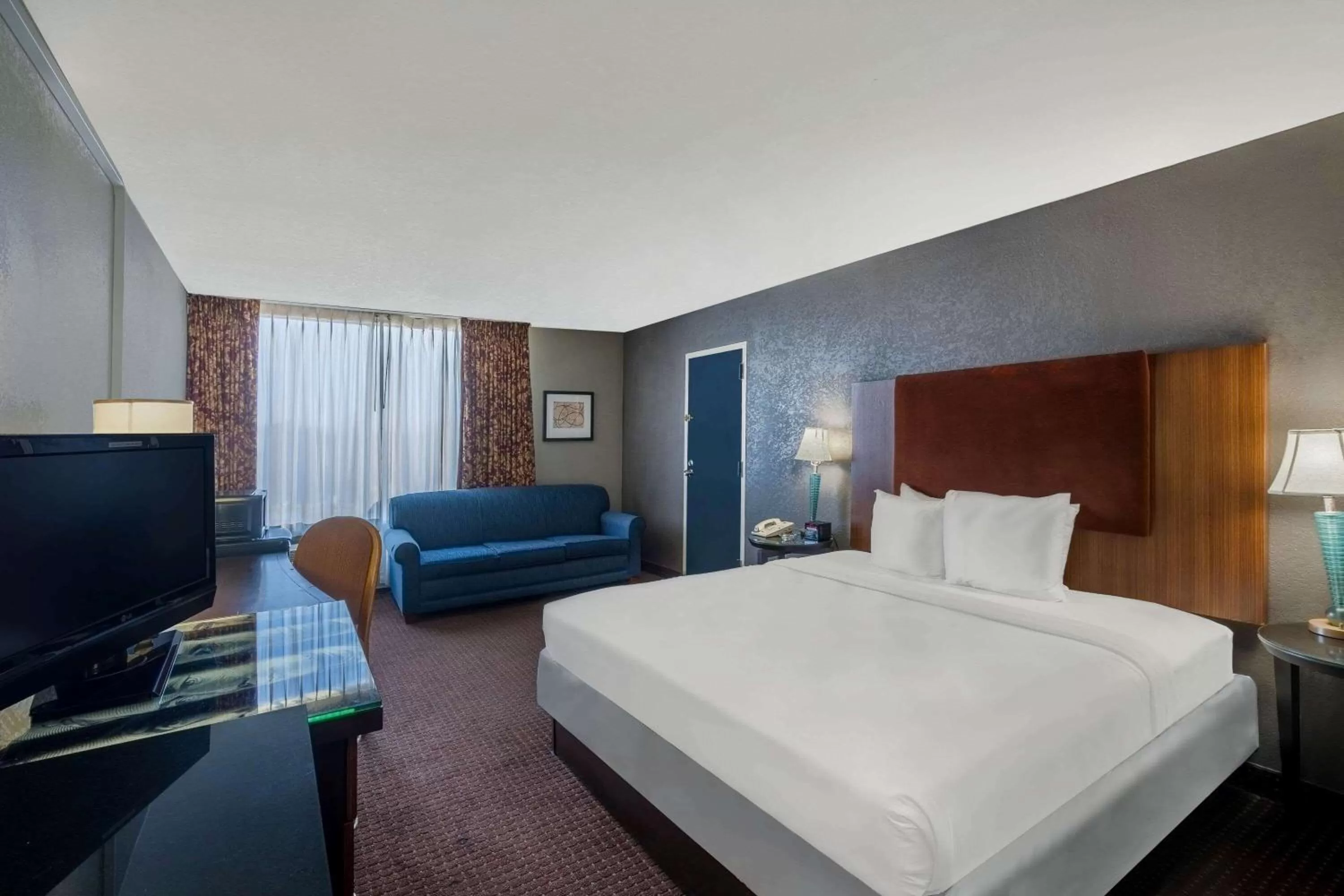 Photo of the whole room in Travelodge by Wyndham Memphis Airport/Graceland