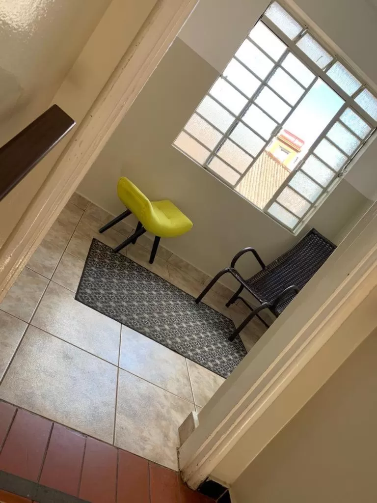 Seating area, Bed in Hotel Central de Anápolis