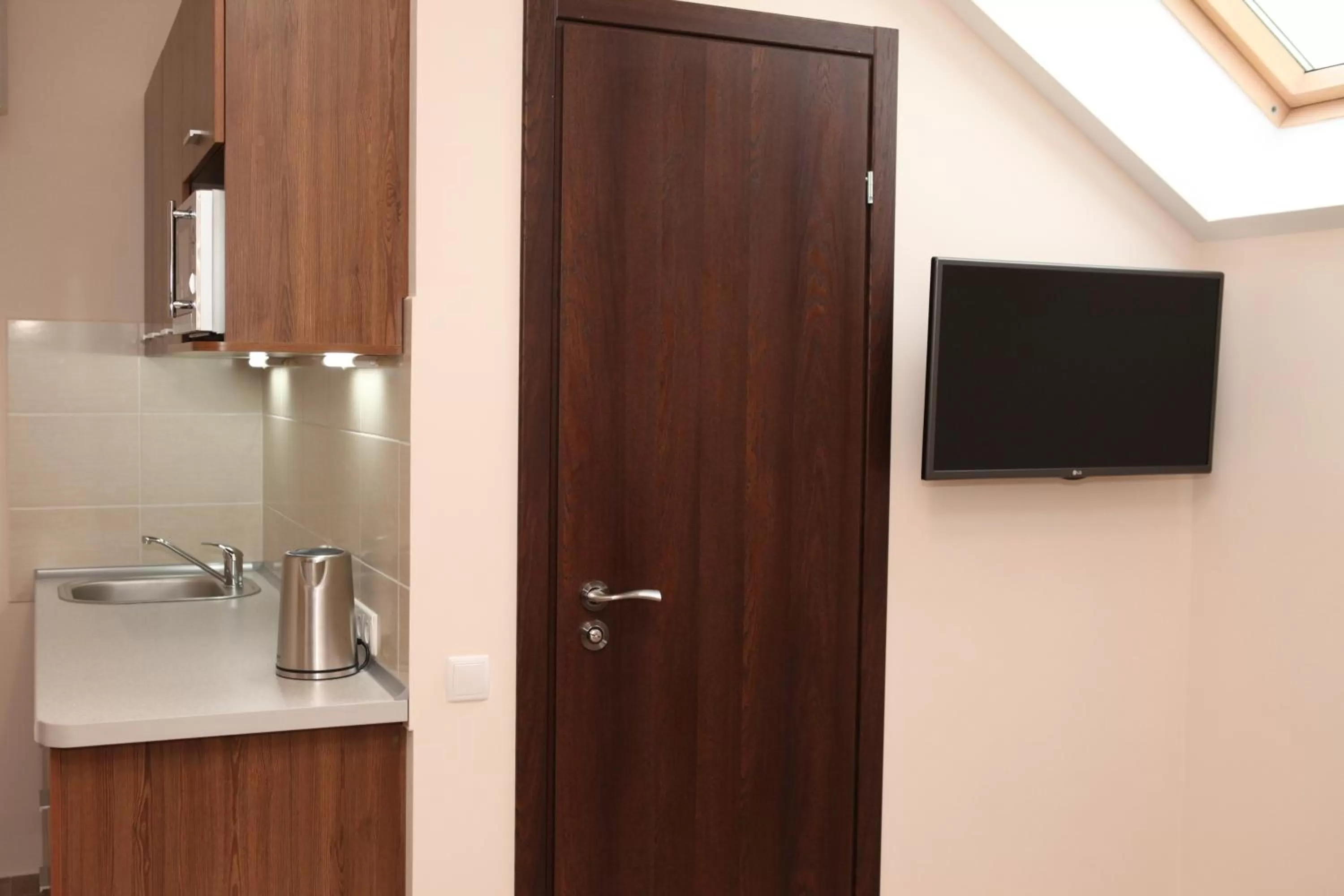 TV and multimedia, TV/Entertainment Center in Sky Hotel