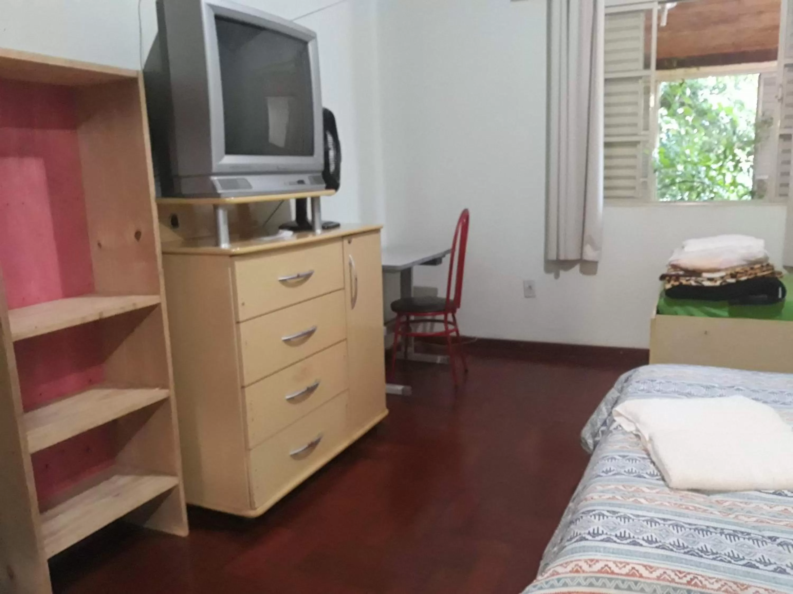 Bed in Pousada do Ribeirão