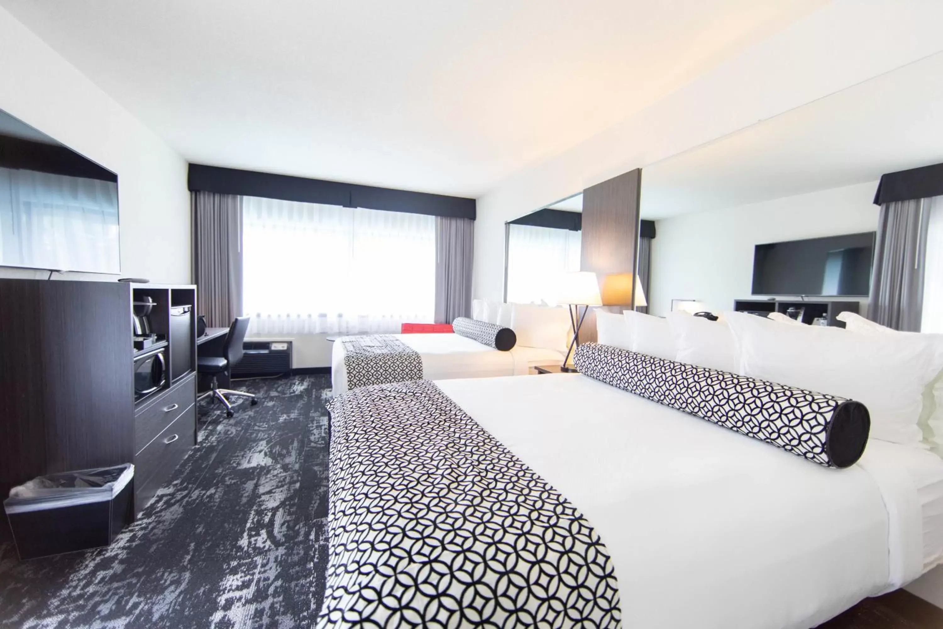 Deluxe Poolside Room with Two Queen Beds in Centennial Hotel Spokane Deluxe Poolside Room with Two Queen Beds in Centennial Hotel Spokane