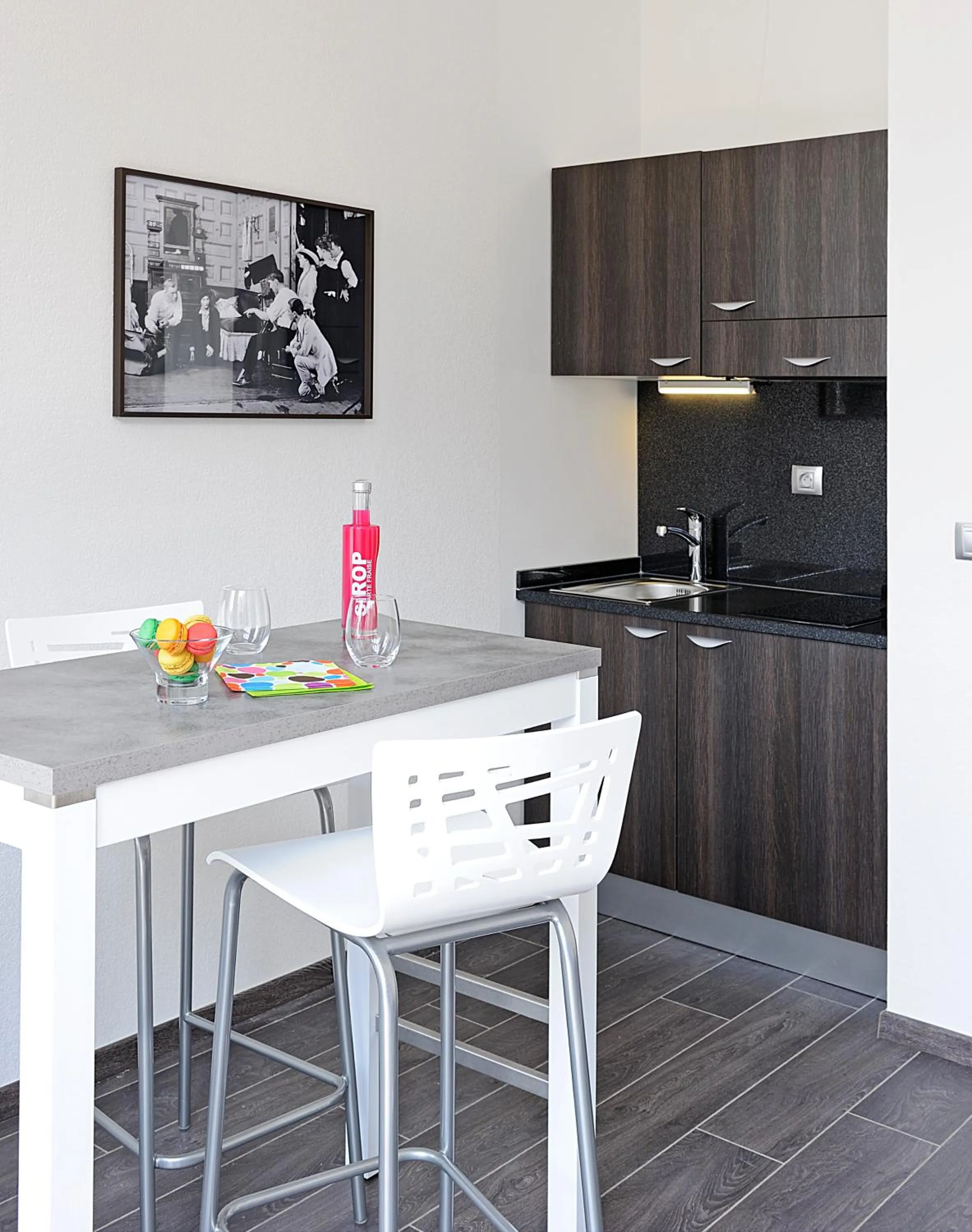 Kitchen or kitchenette in Lagrange Aparthotel Lyon Lumière