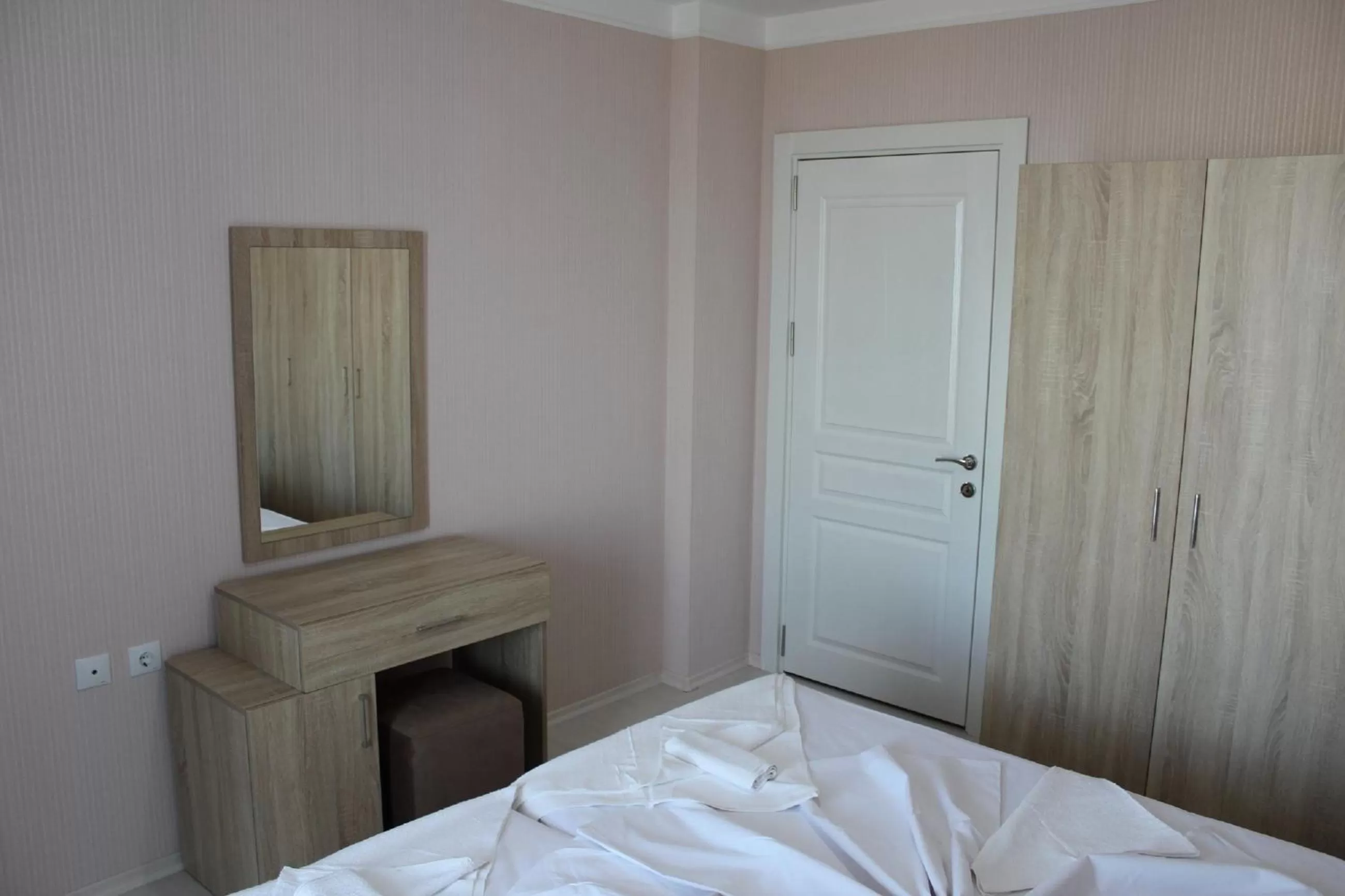 Bed in APART-HOTEL Stamopolu Lux с изглед към морето