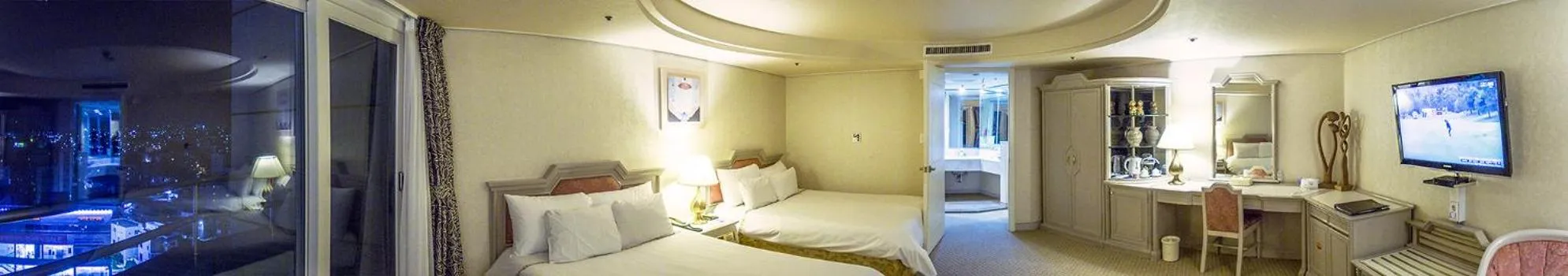 Bed in Jeju Pacific Hotel