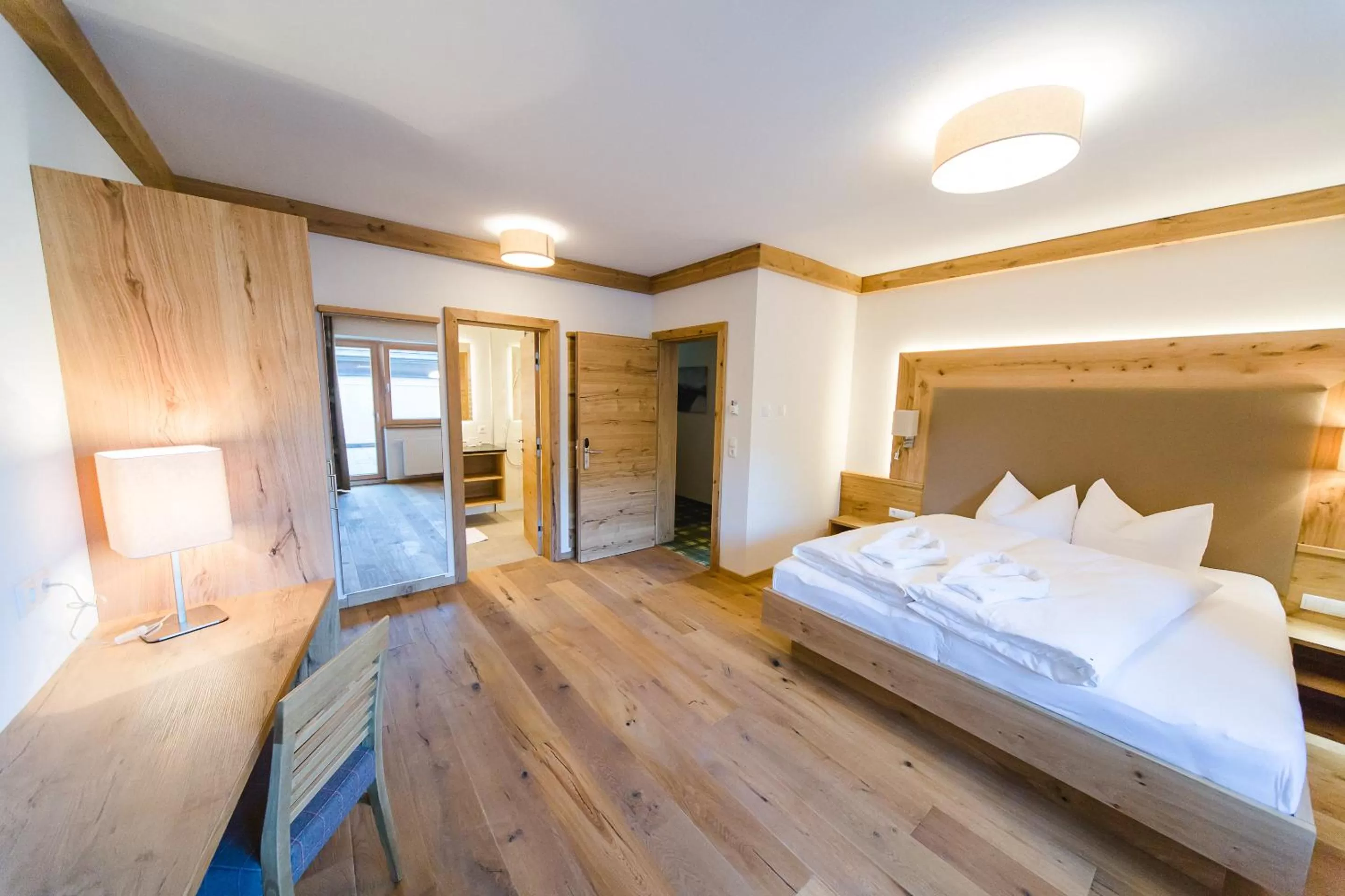 Living room, Bed in Hotel Giessenbach