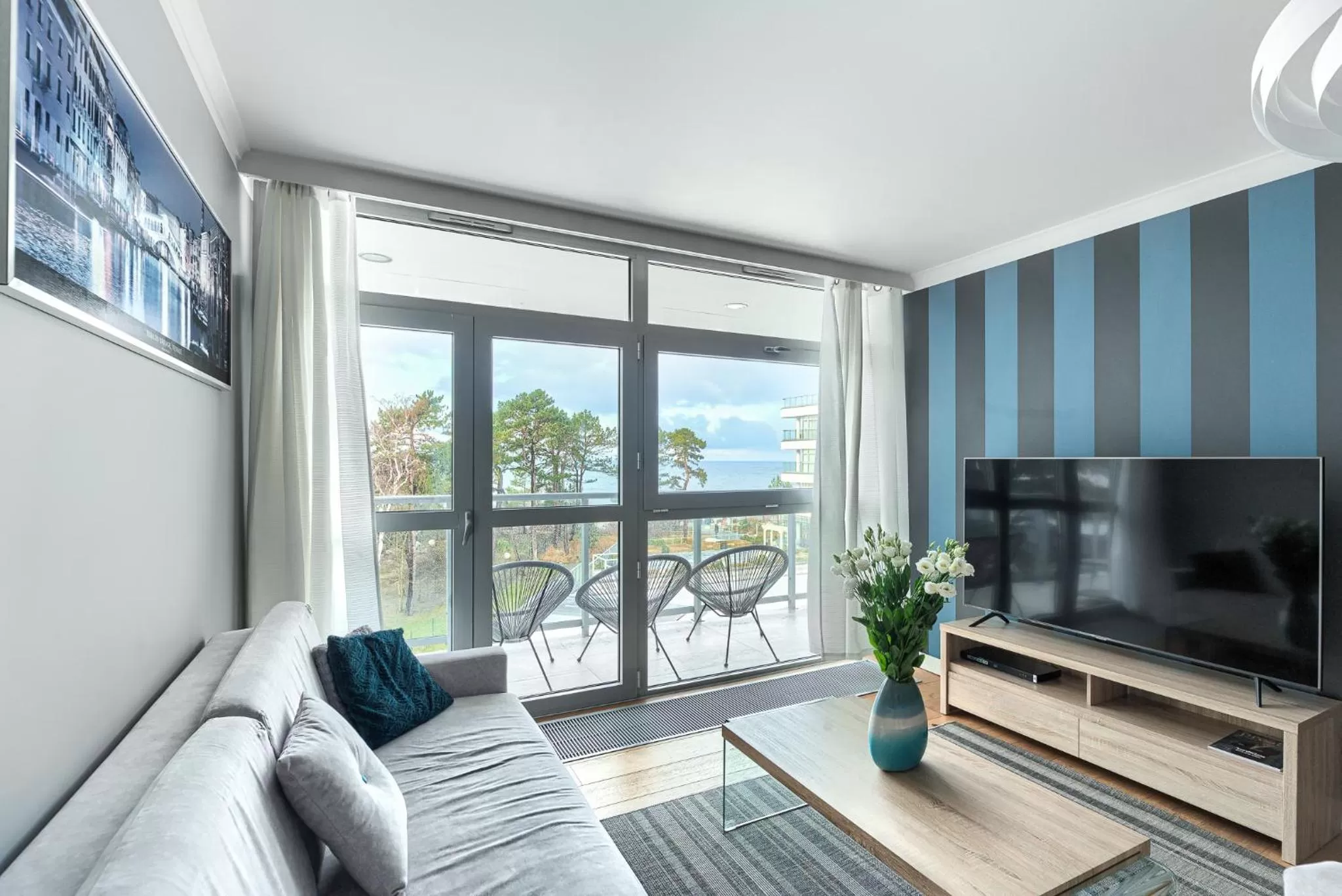 Communal lounge/ TV room in Dune Resort Mielno - A