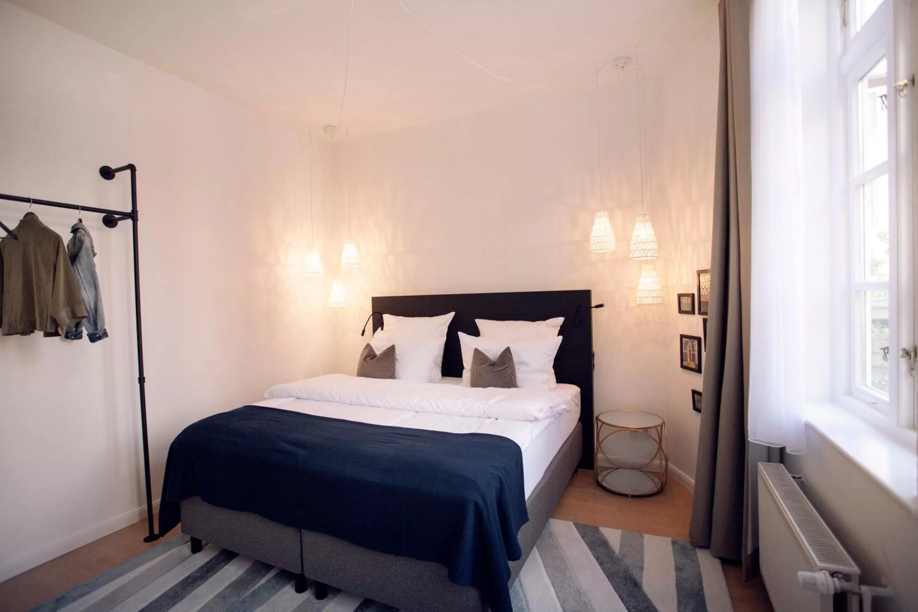 Bed in ONNO Boutique Hotel & Apartments