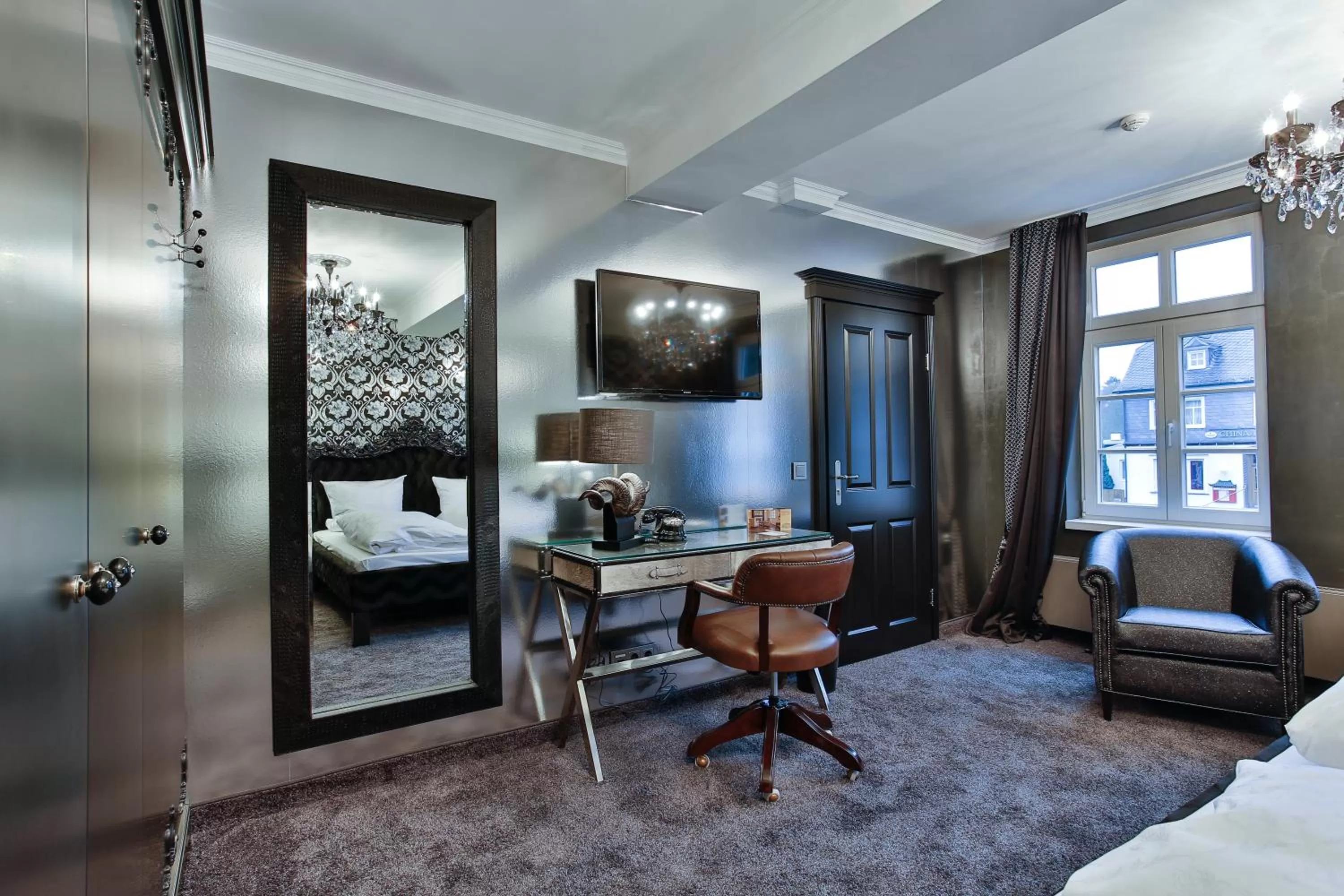 Seating area, Bed in Hotel Alte Schule