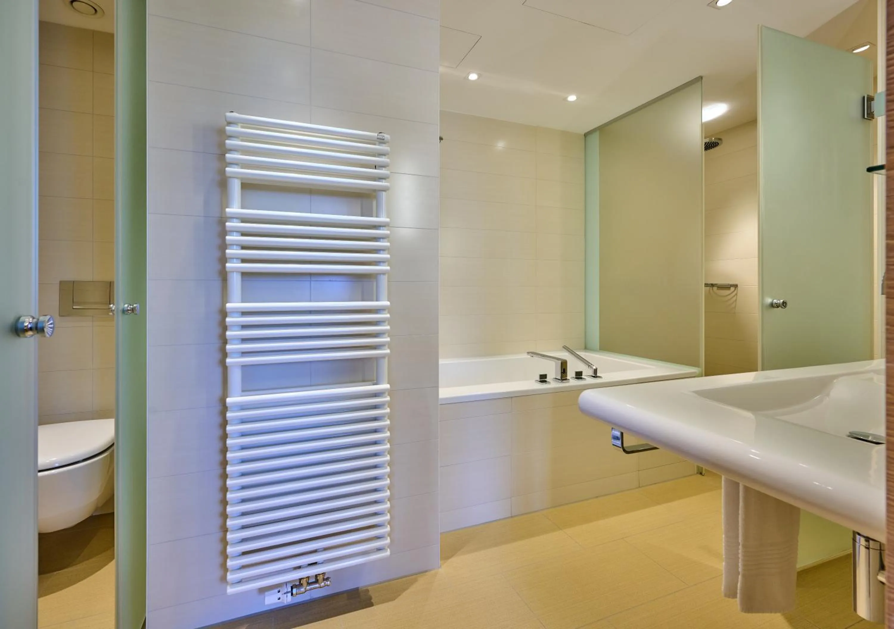 Bathroom in Asam Hotel