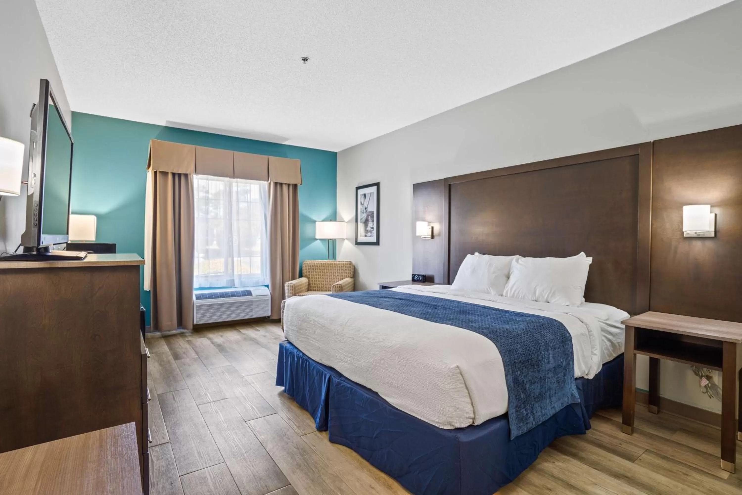 Bedroom, Bed in Blue Water Inn & Suites BW Signature Collection