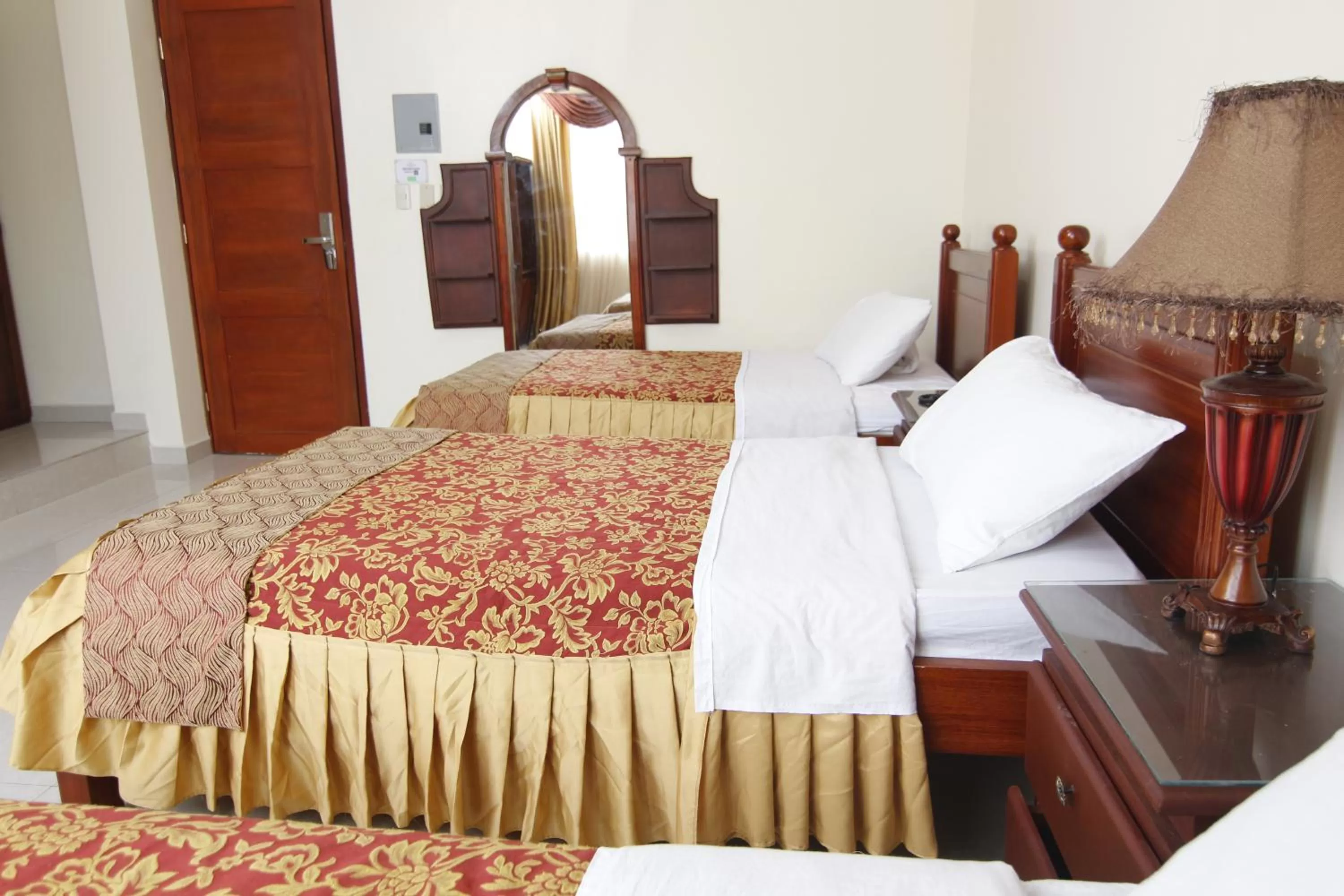 Bed in Hotel Versailles Internacional