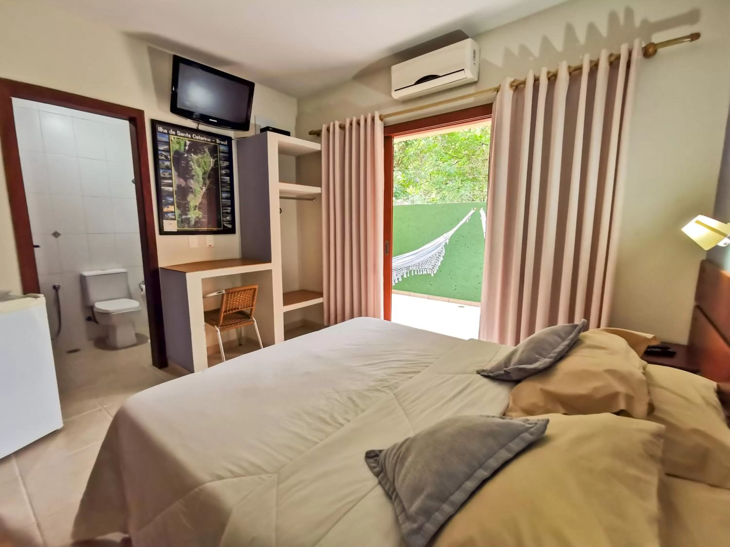 Bed in Pousada Ilha dos Anjos