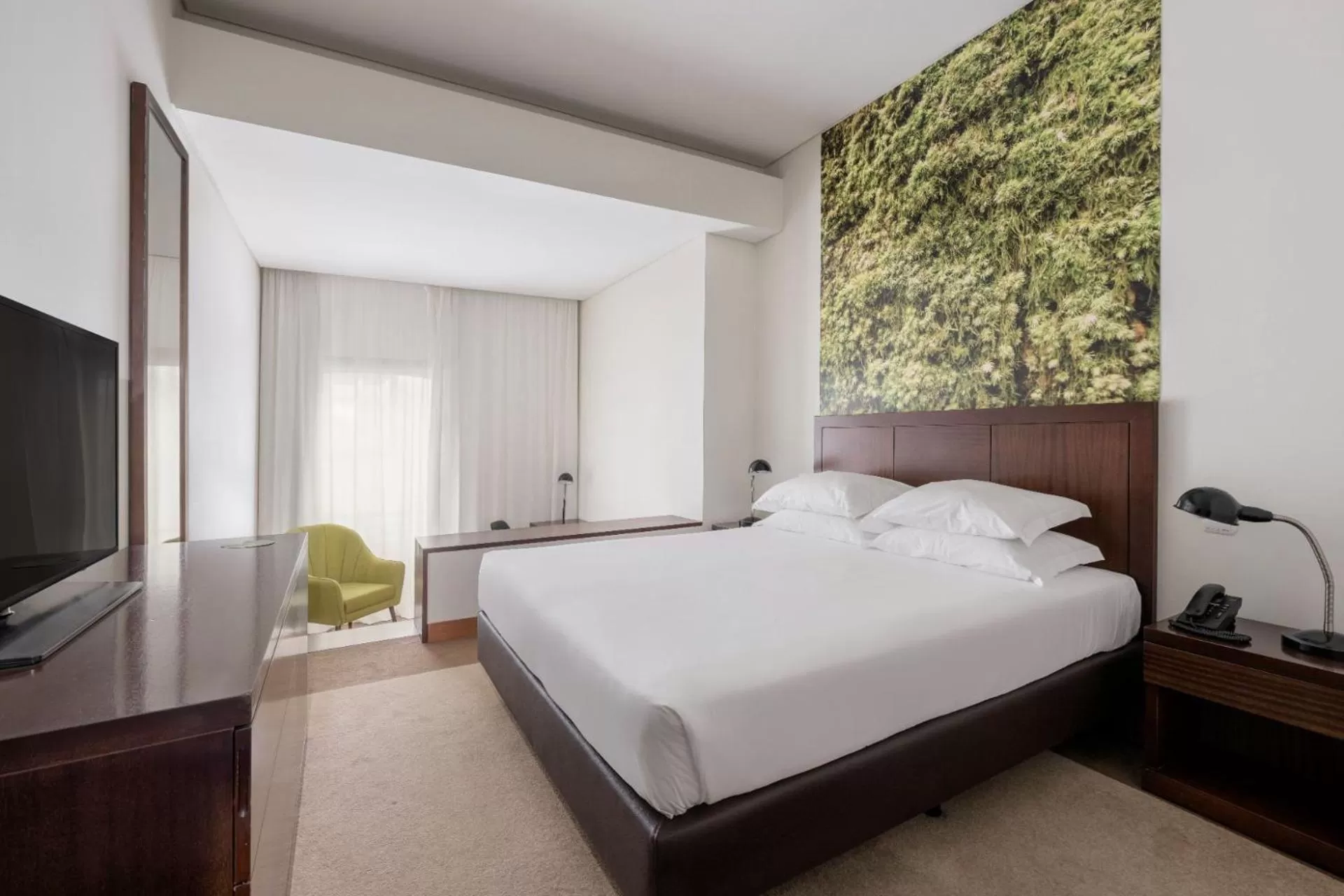 Bed in Neat Hotel Avenida