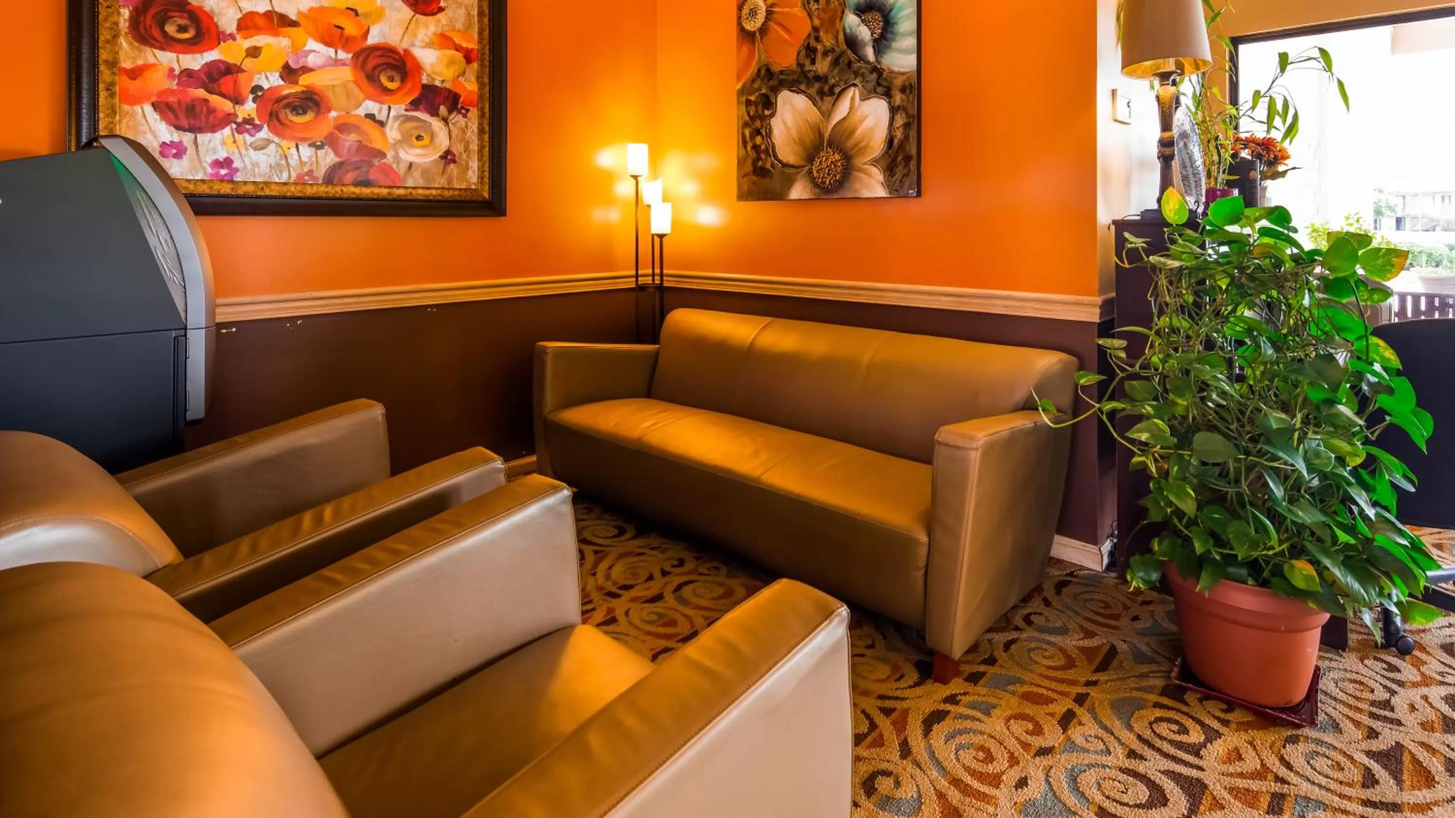 Seating area in SureStay Plus Hotel by Best Western Fayetteville