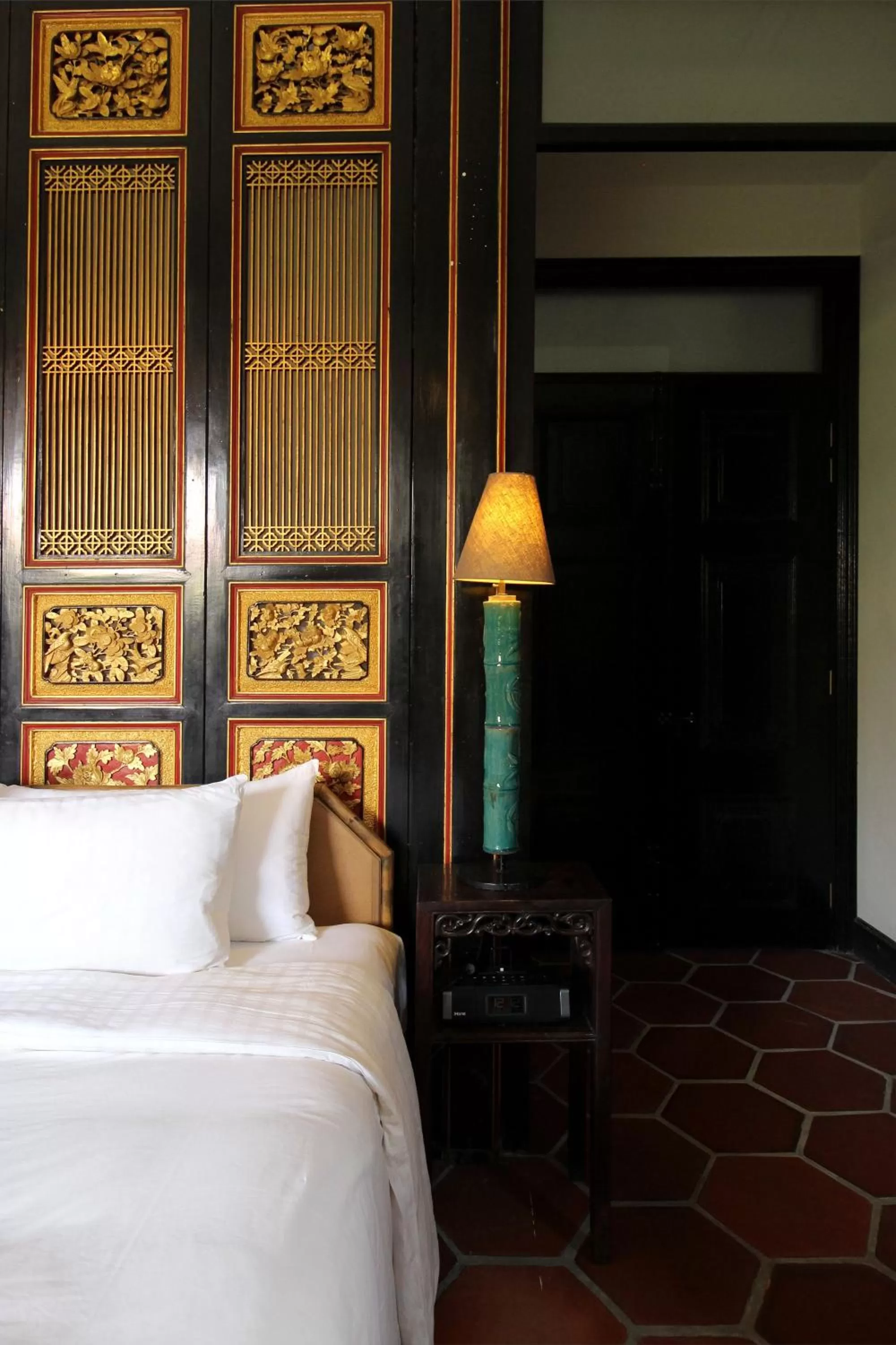 Decorative detail, Bed in Cheong Fatt Tze - The Blue Mansion