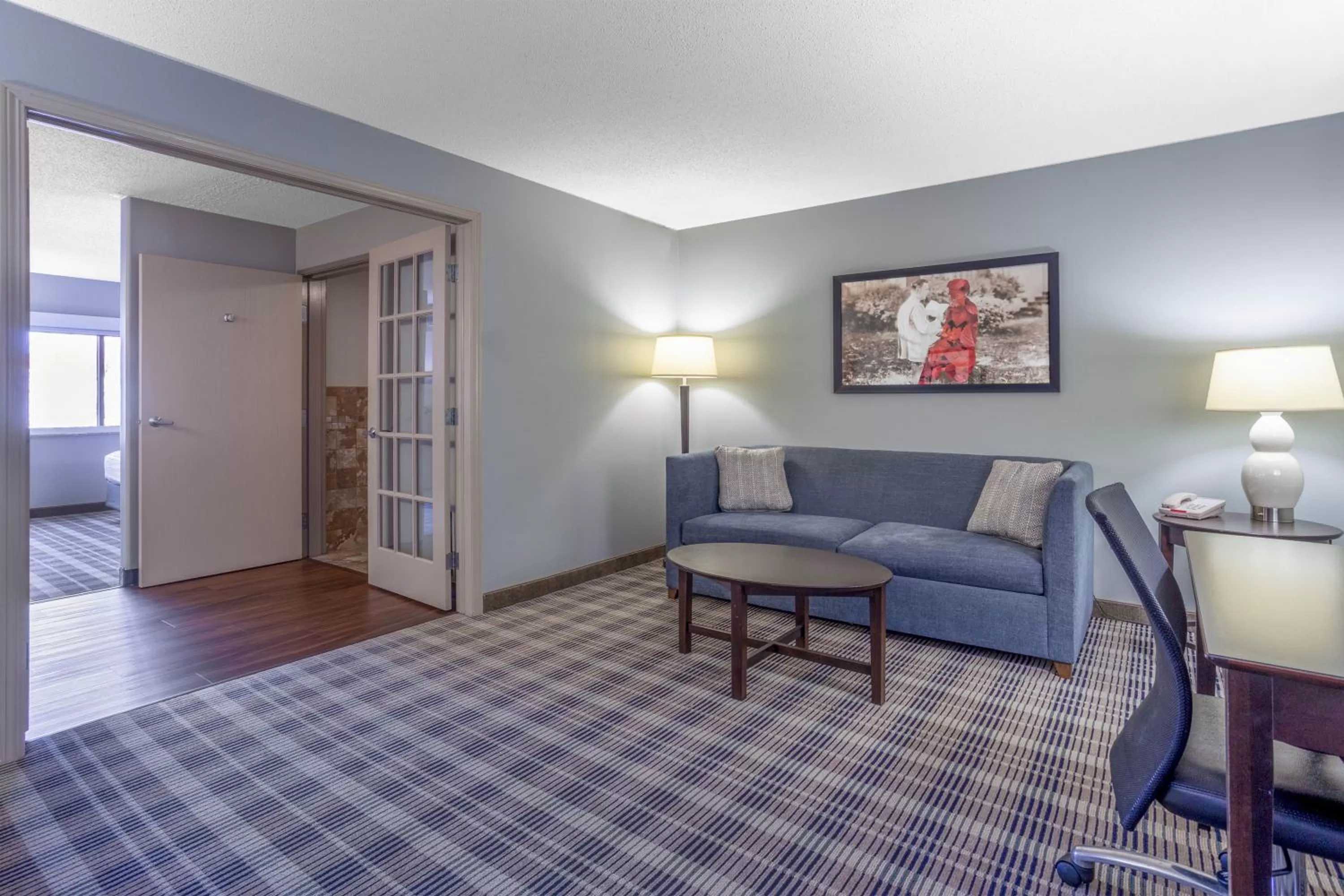 Seating area in AmericInn by Wyndham Madison South