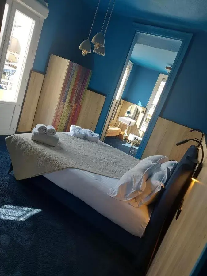 Quadruple Room in Hôtel les 4 éléments Quadruple Room in Hôtel les 4 éléments