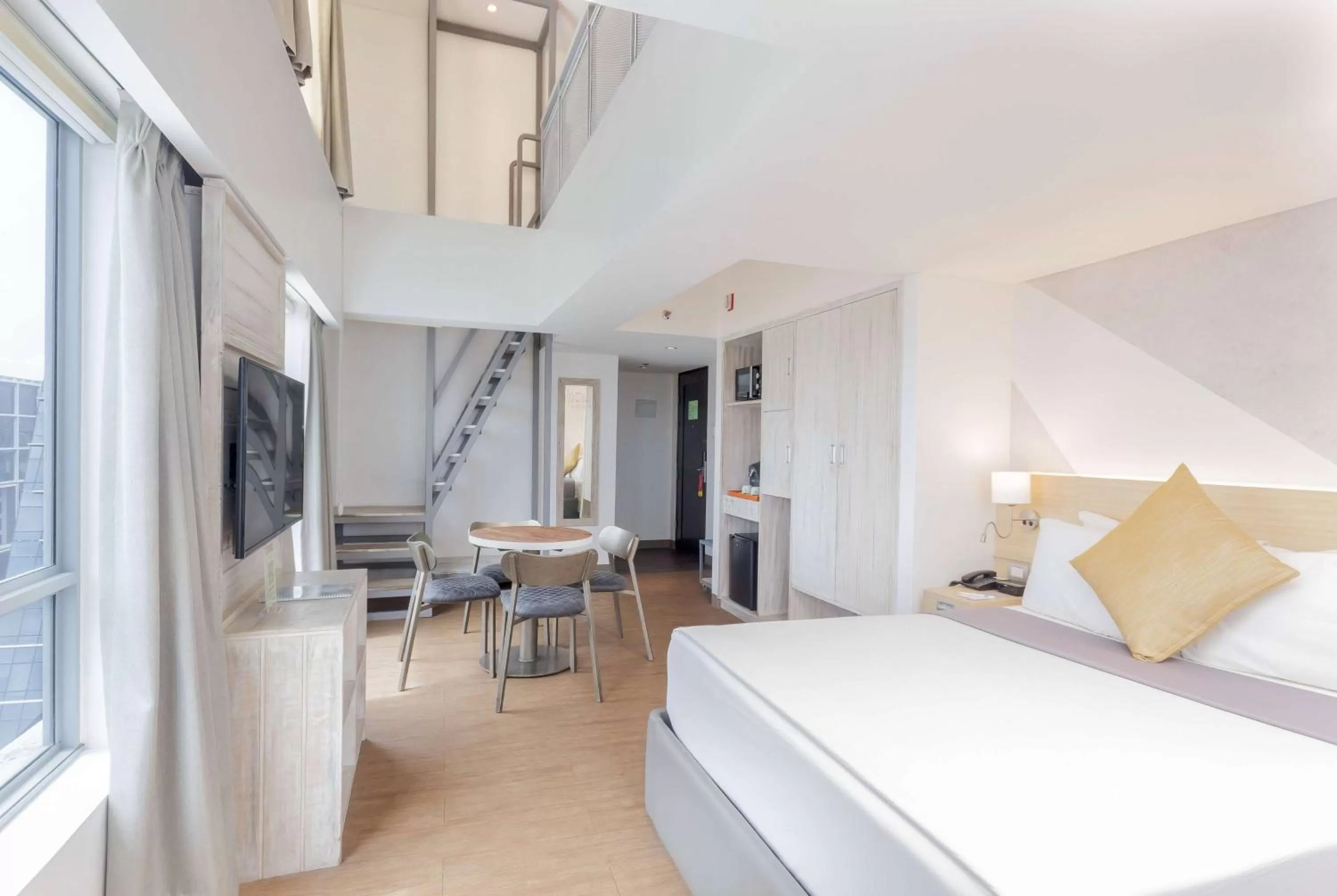 Photo of the whole room, Bed in TRYP by Wyndham Mall of Asia Manila