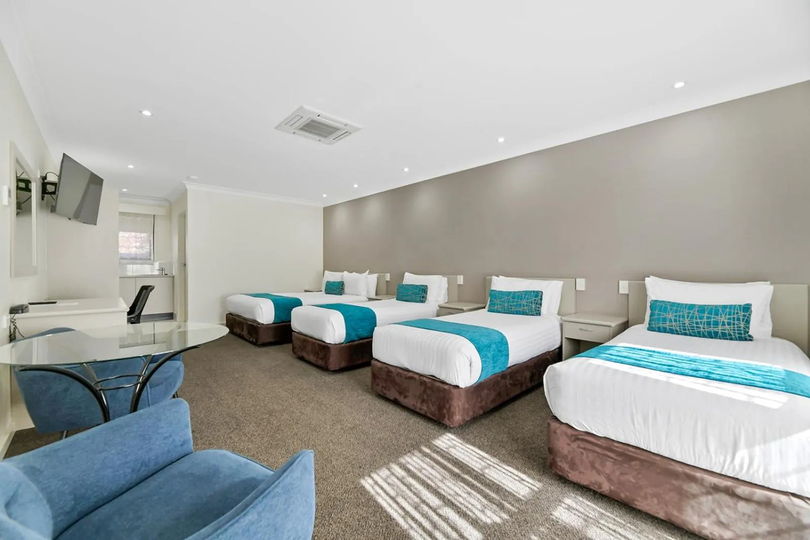 Bed in Central Caleula Motor Lodge