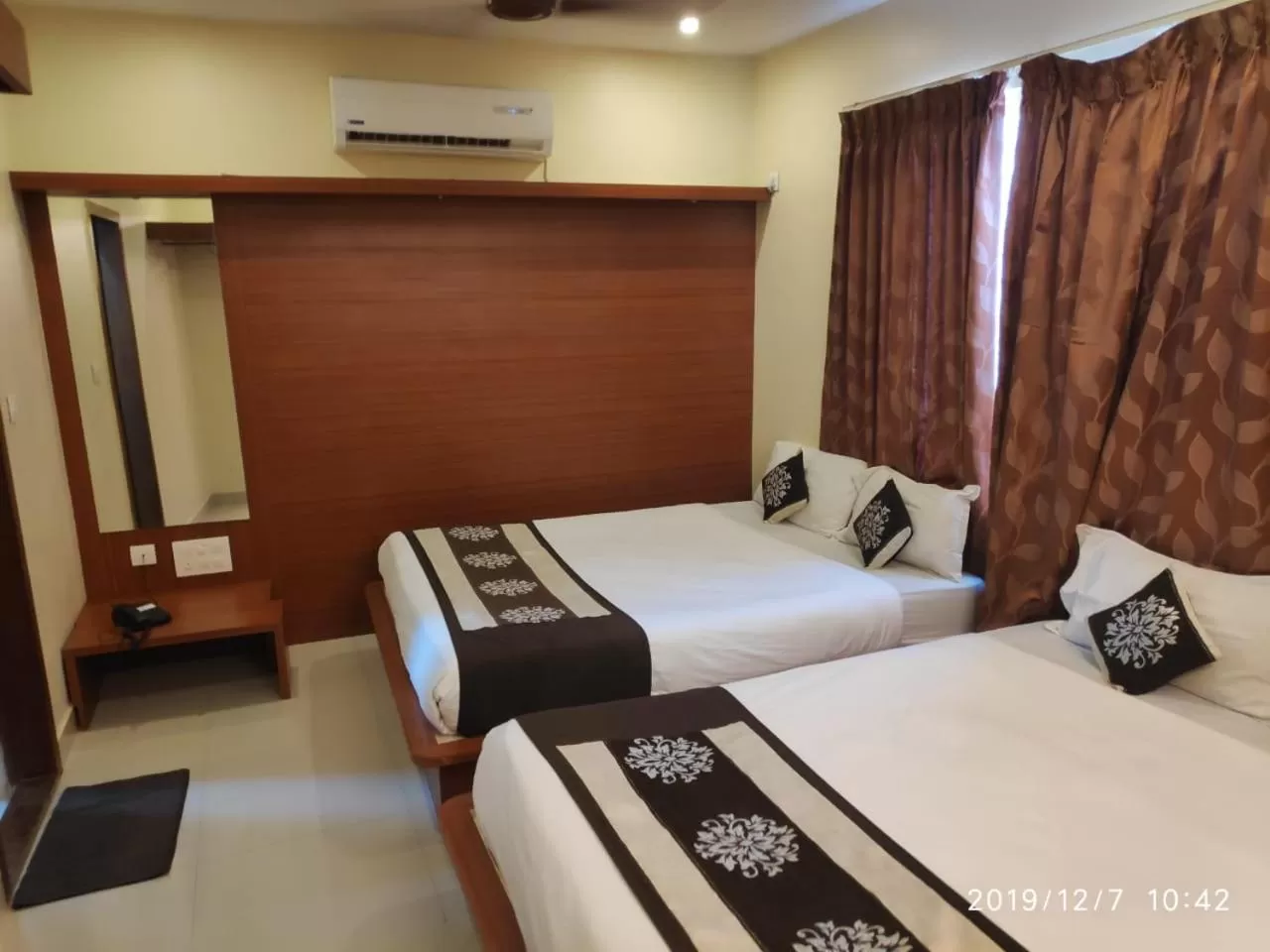 Photo of the whole room, Bed in The Grand Inn Mysore