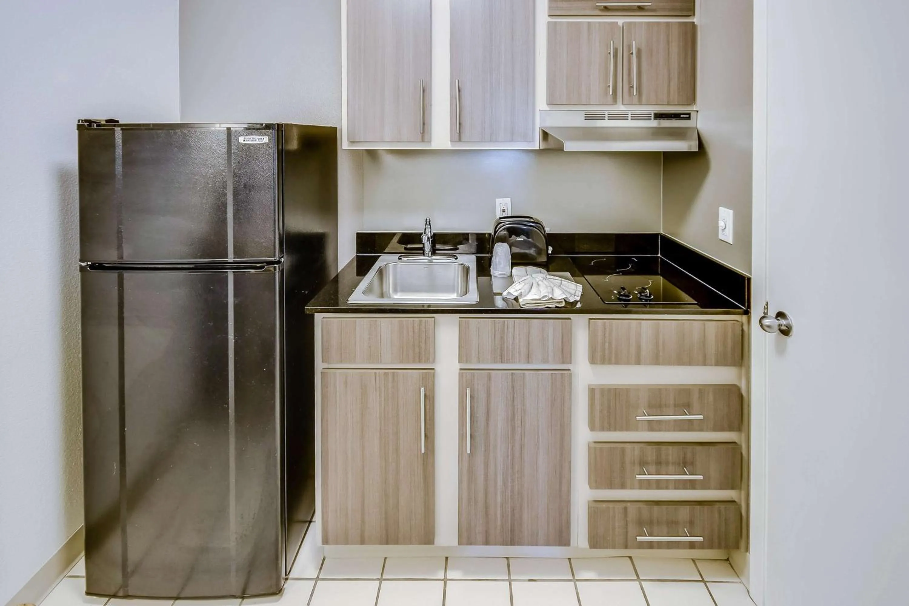 Kitchen or kitchenette in Studio 6-Houston, TX - Hobby South