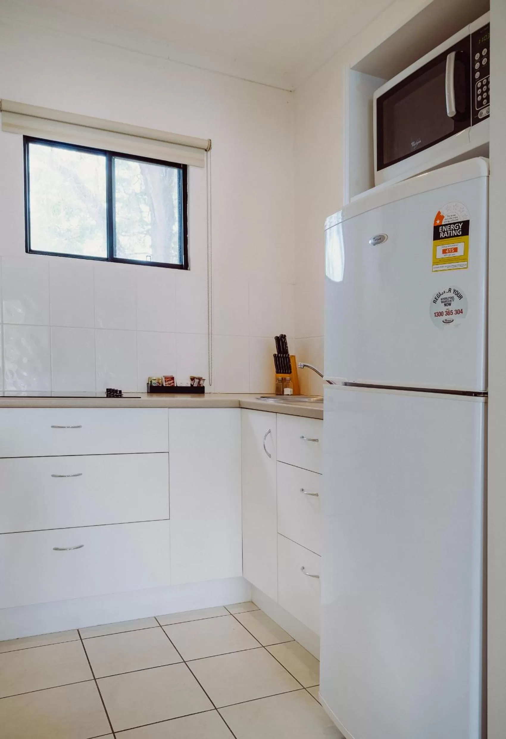 Kitchen or kitchenette in Artesian Spa Motel