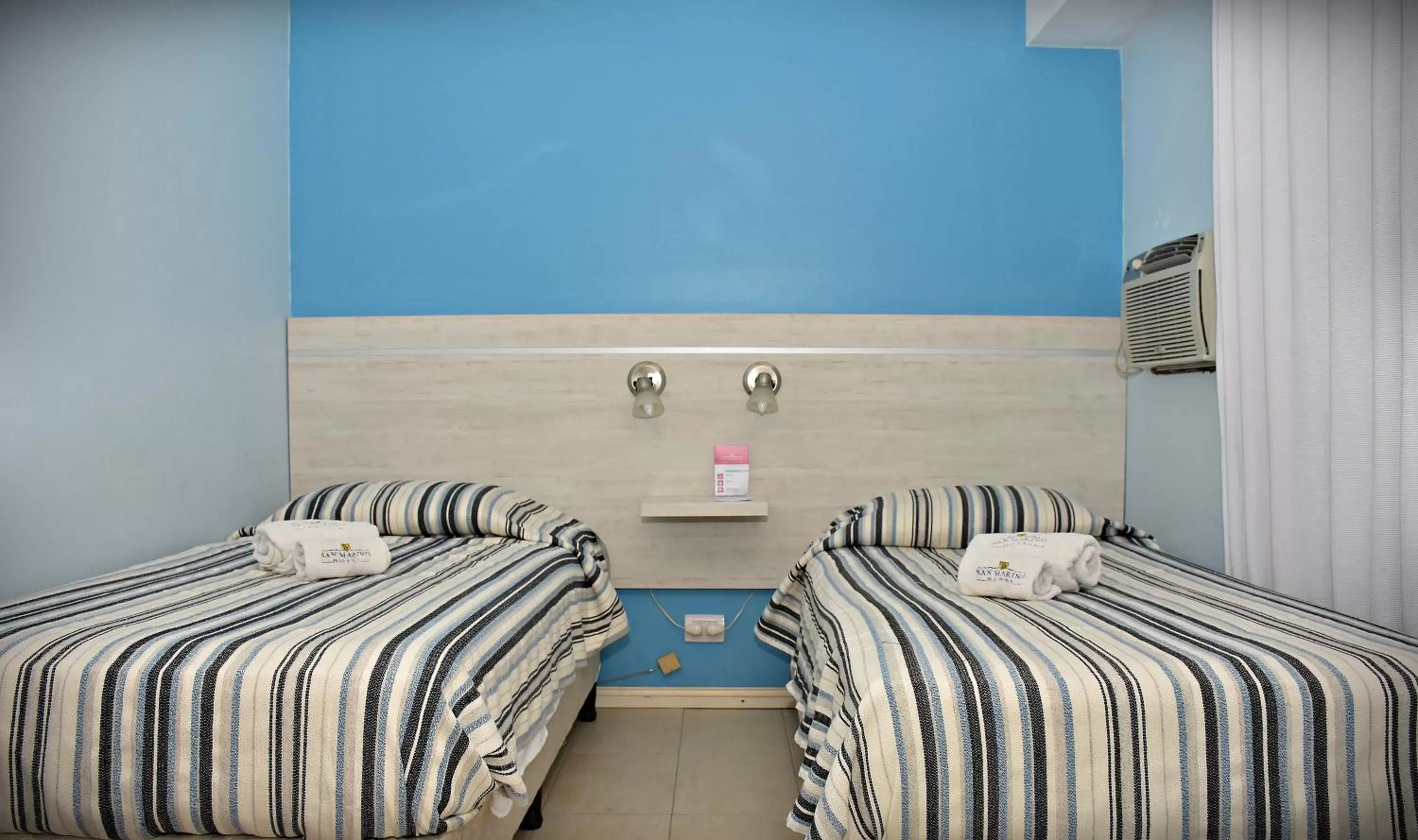 Bed in Hotel San Marino