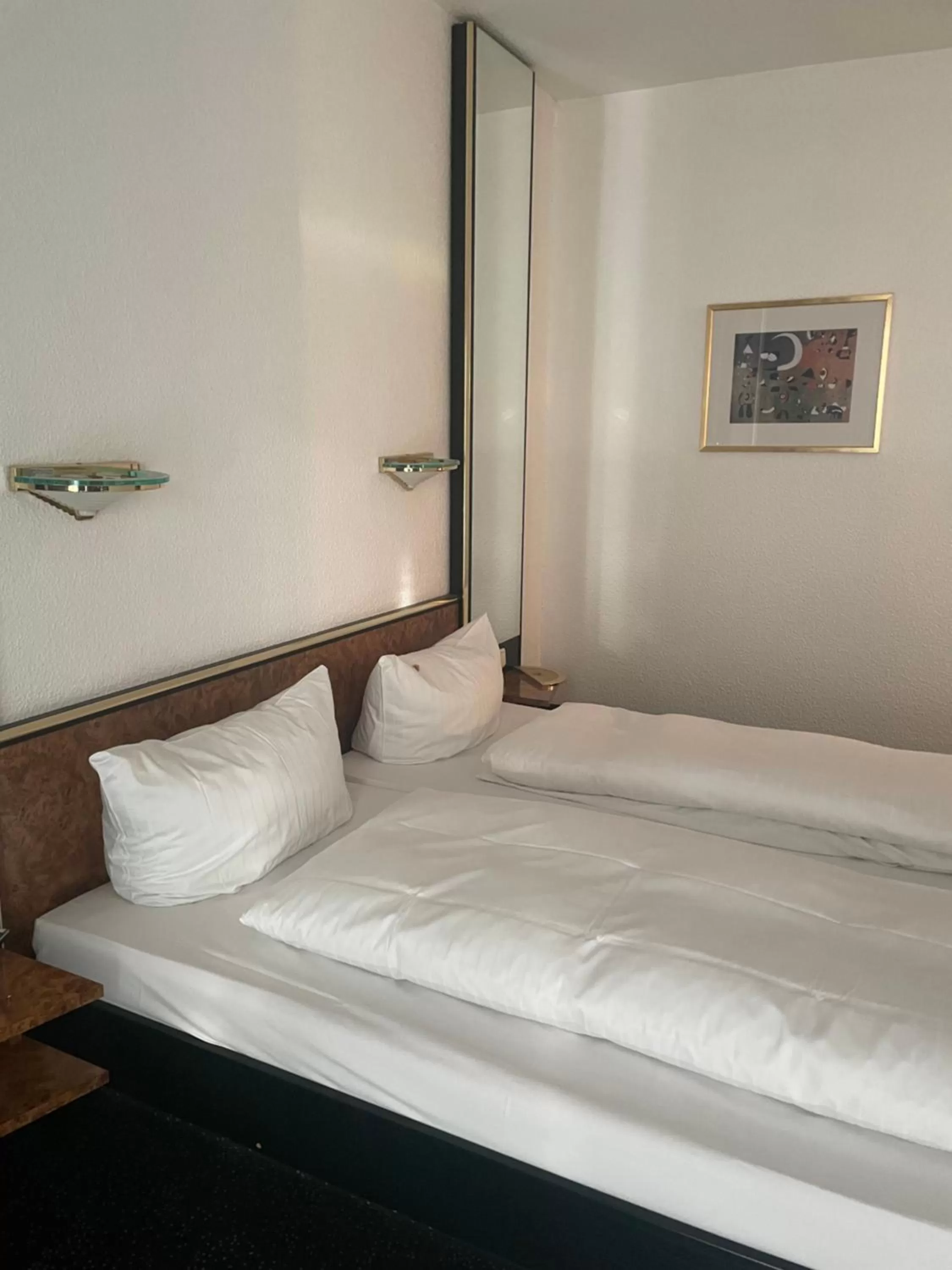 Bed in Hotel Bitterfelder Hof