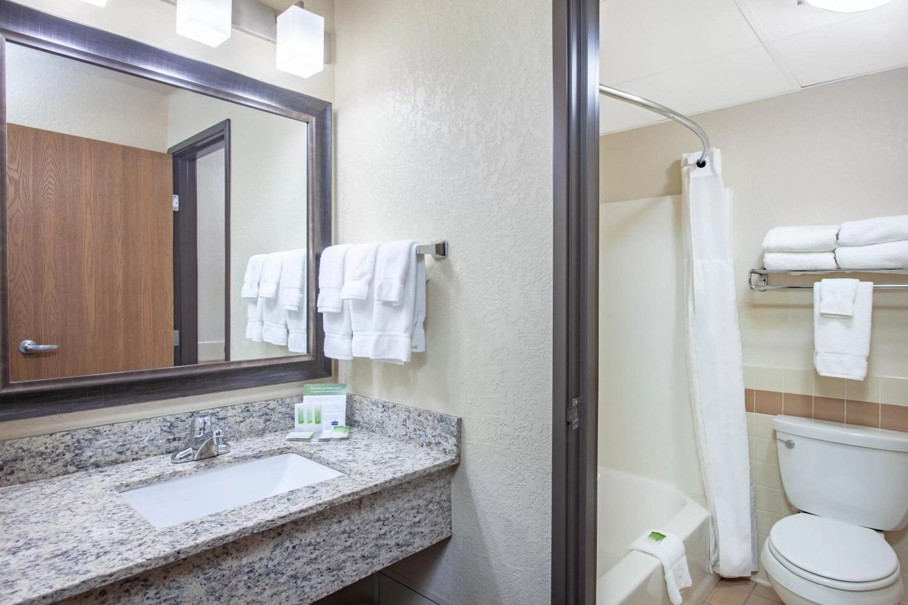 Bathroom in AmericInn by Wyndham Mankato Event Center near MSU