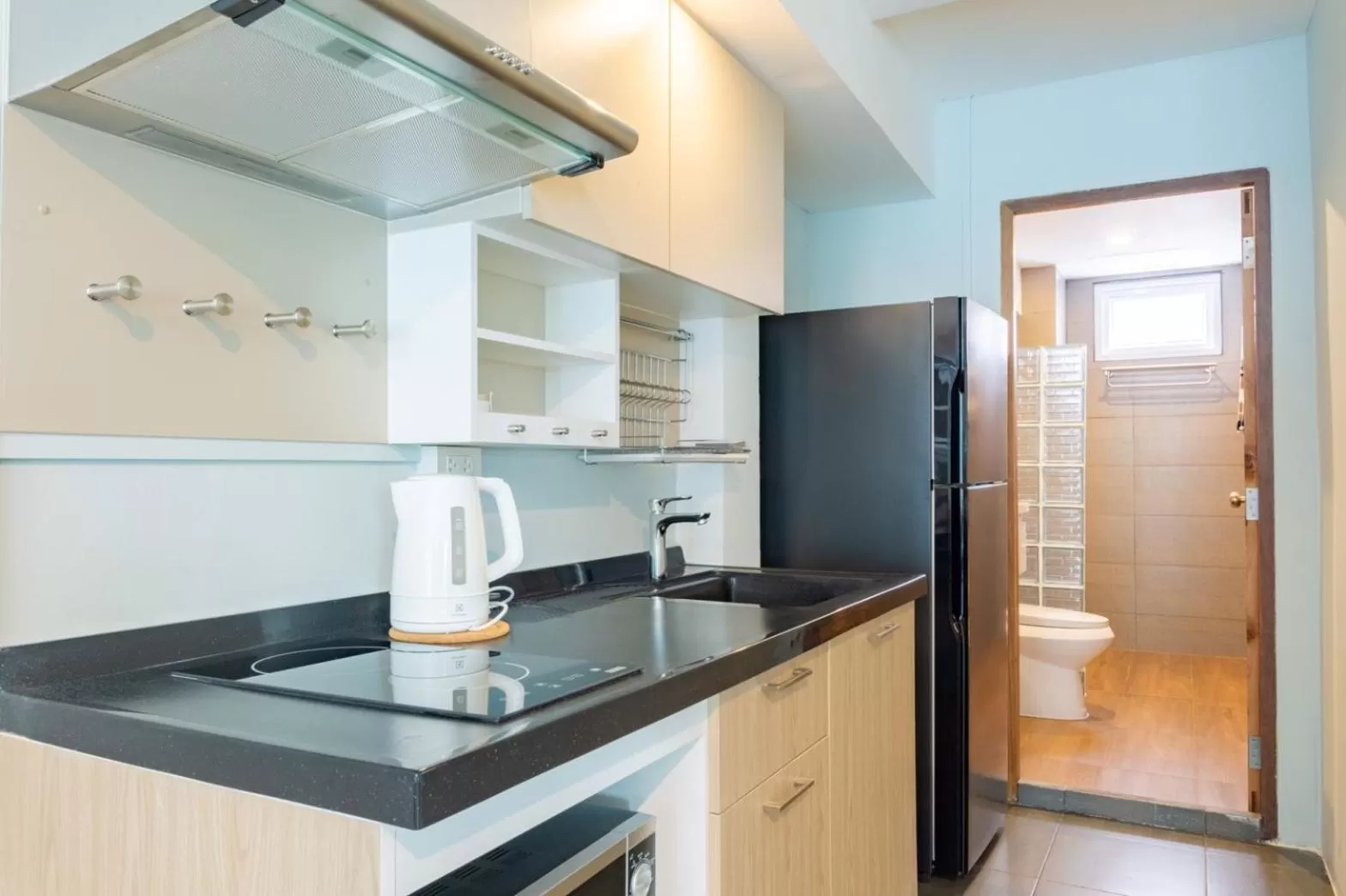 Kitchen or kitchenette in THE BEACH CHA AM Suites