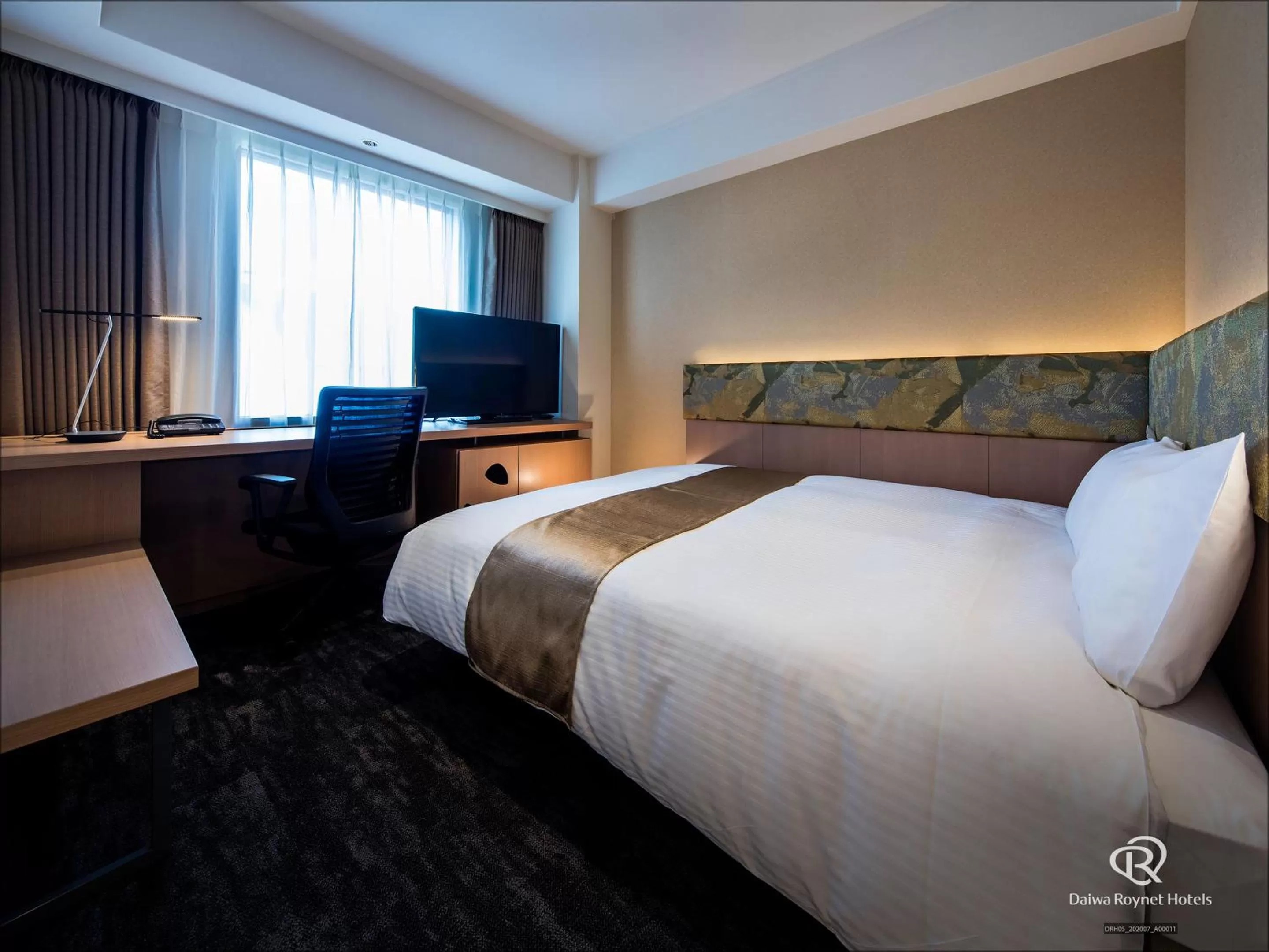 Bed in Daiwa Roynet Hotel Kyoto Ekimae PREMIER