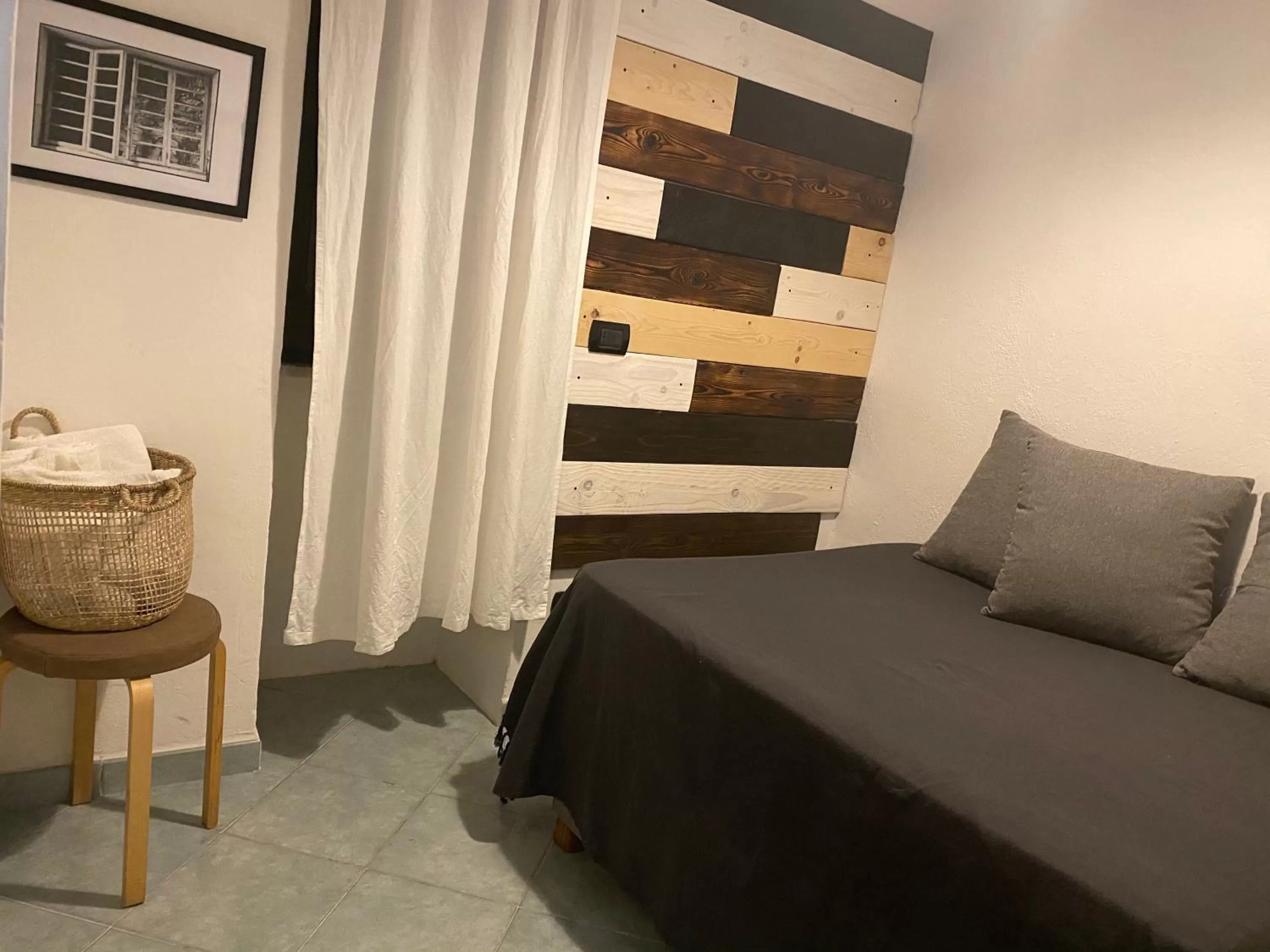 Bedroom in Black Market Hotel