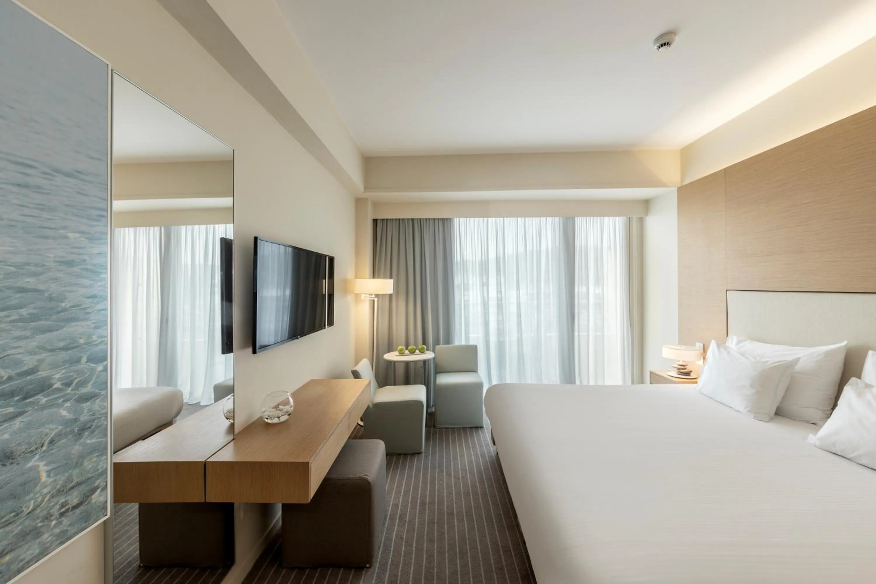 Bed in Capo Bay Hotel