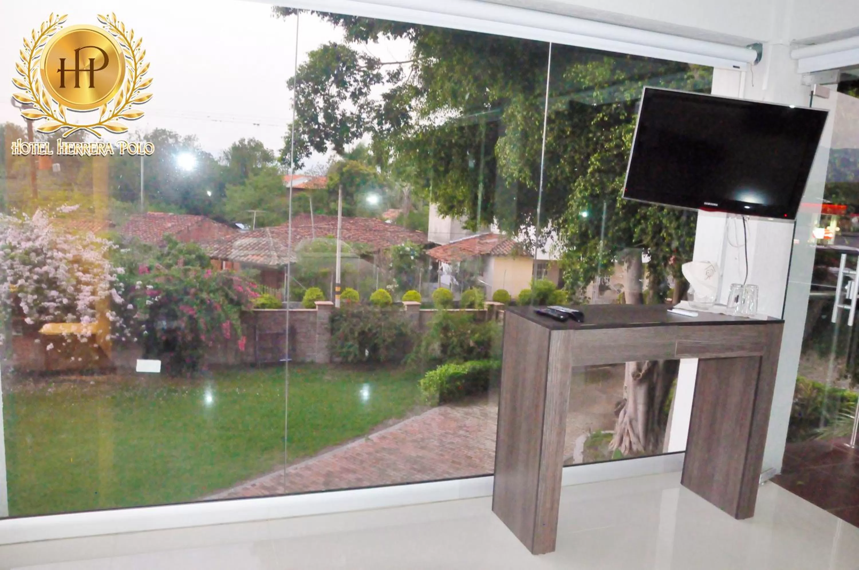 TV and multimedia, TV/Entertainment Center in Hotel Herrera Polo