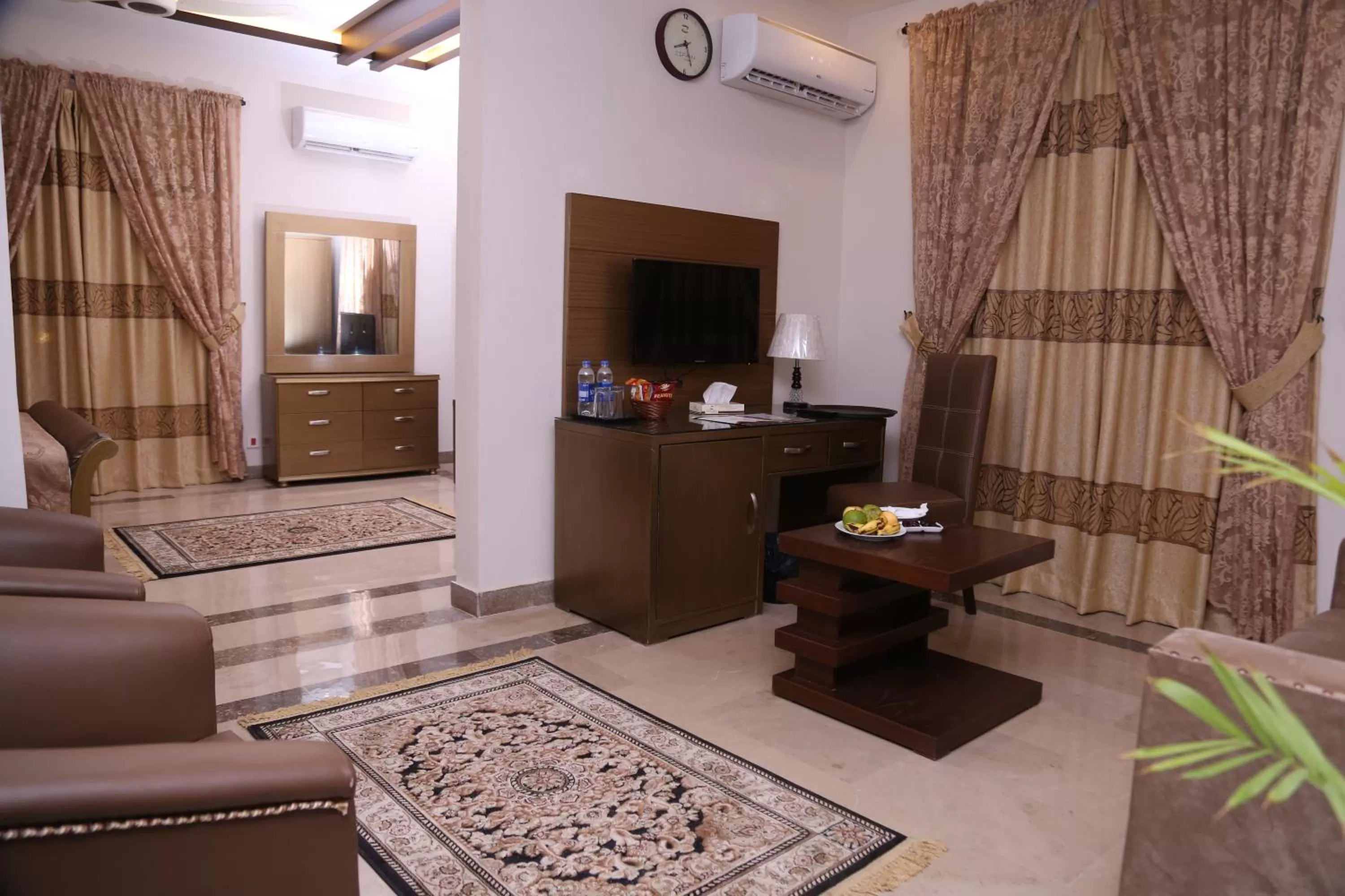 TV/Entertainment Center in Zifan Hotel & Suites