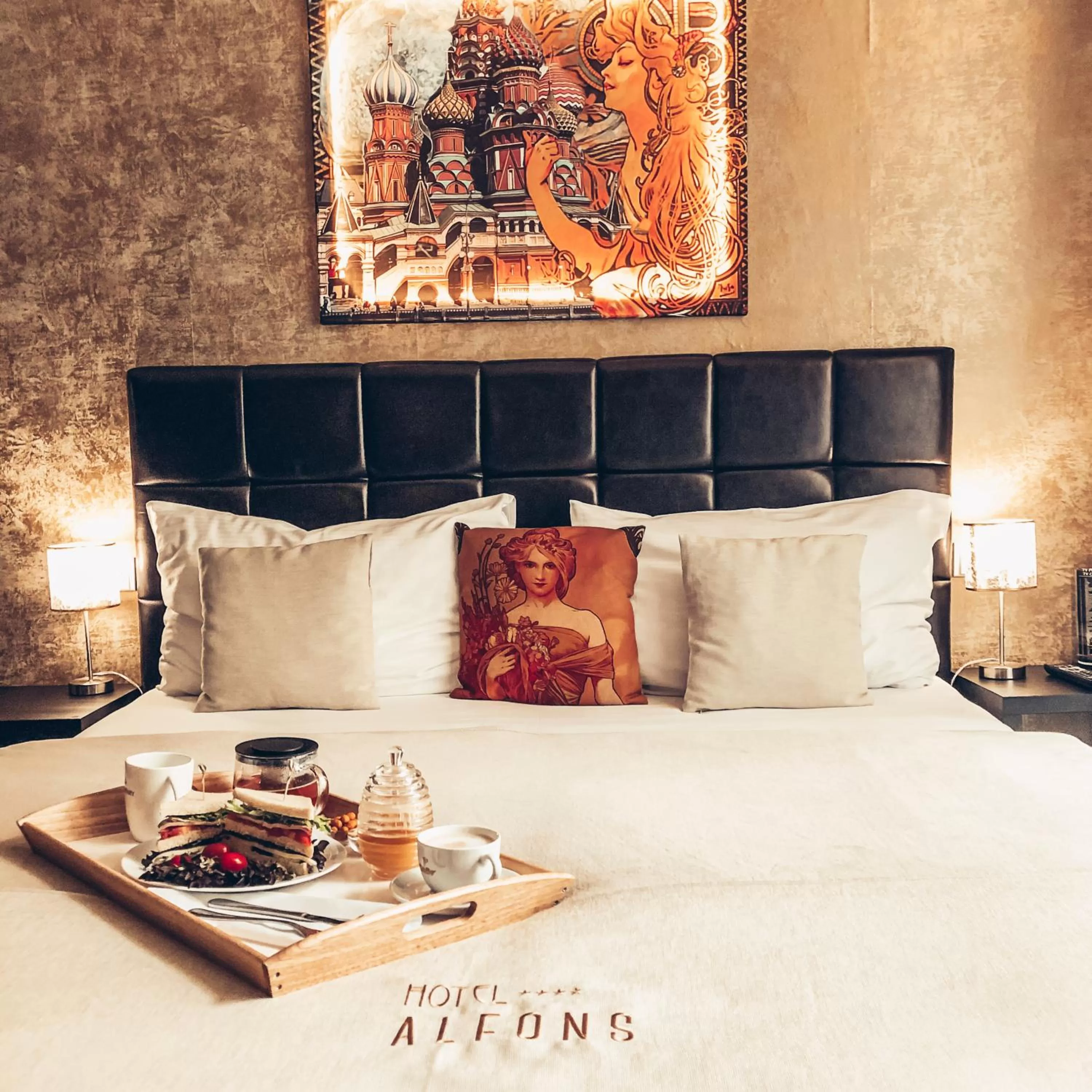Bed in Alfons Boutique Hotel