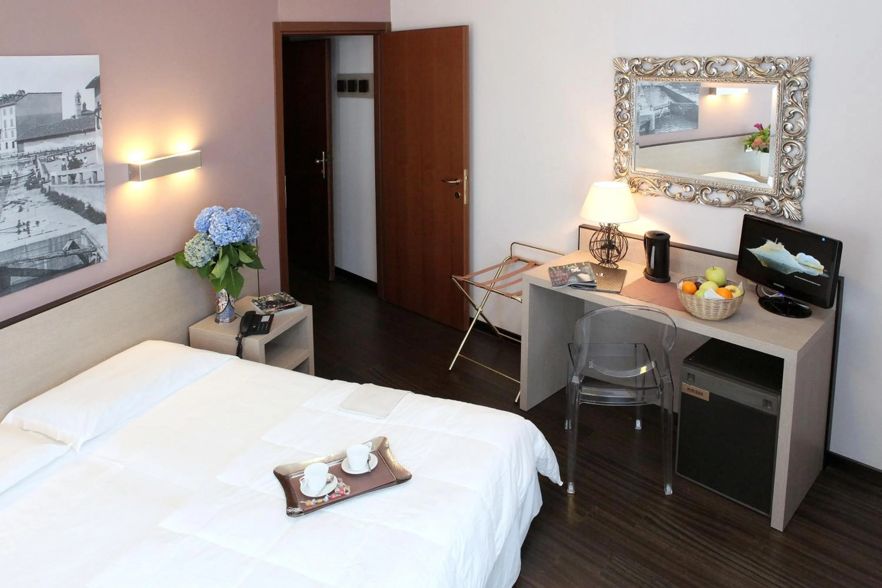 Seating area, Bed in Hotel Mennini