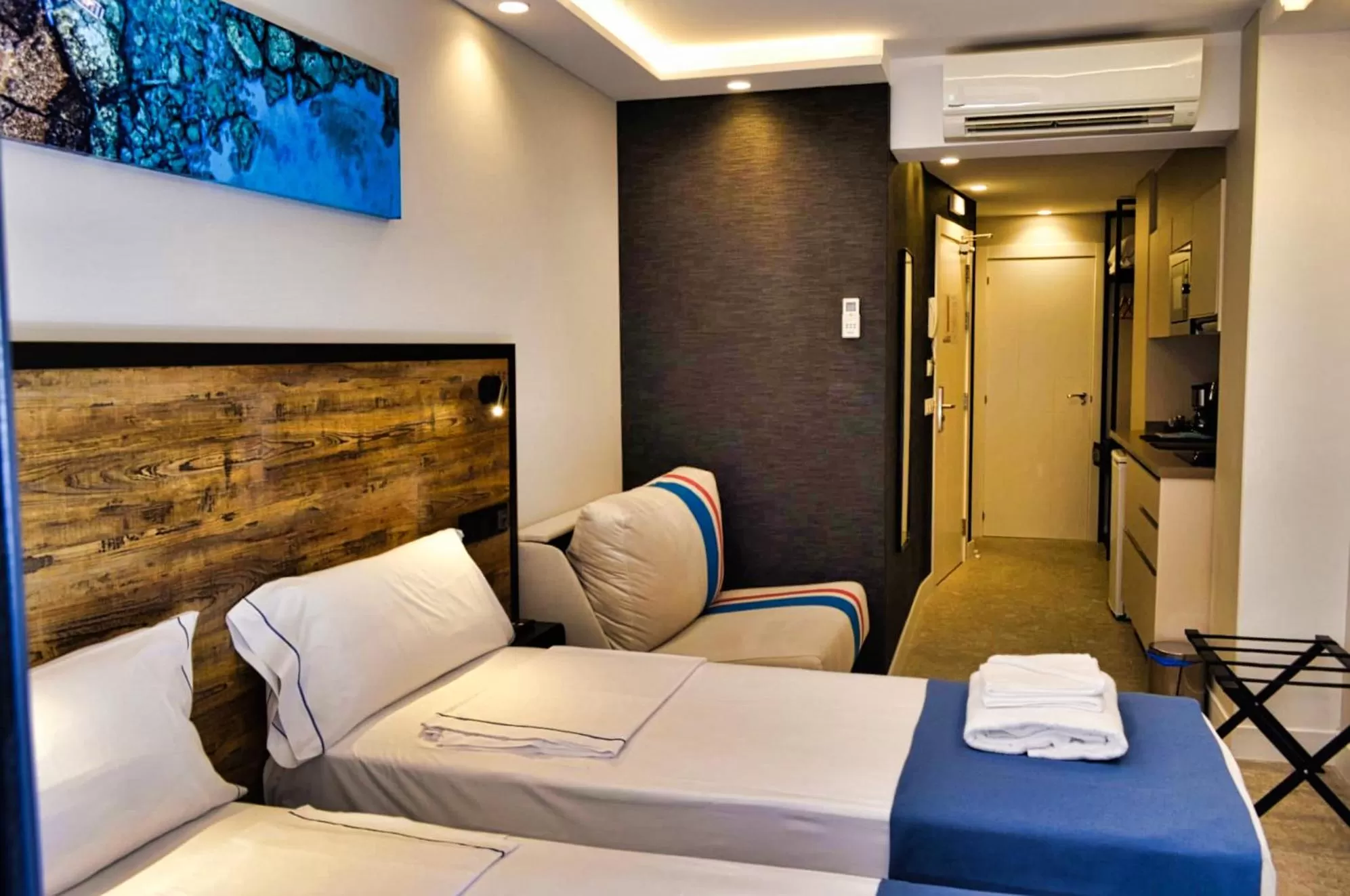 Bed in Posidonia Aparthotel